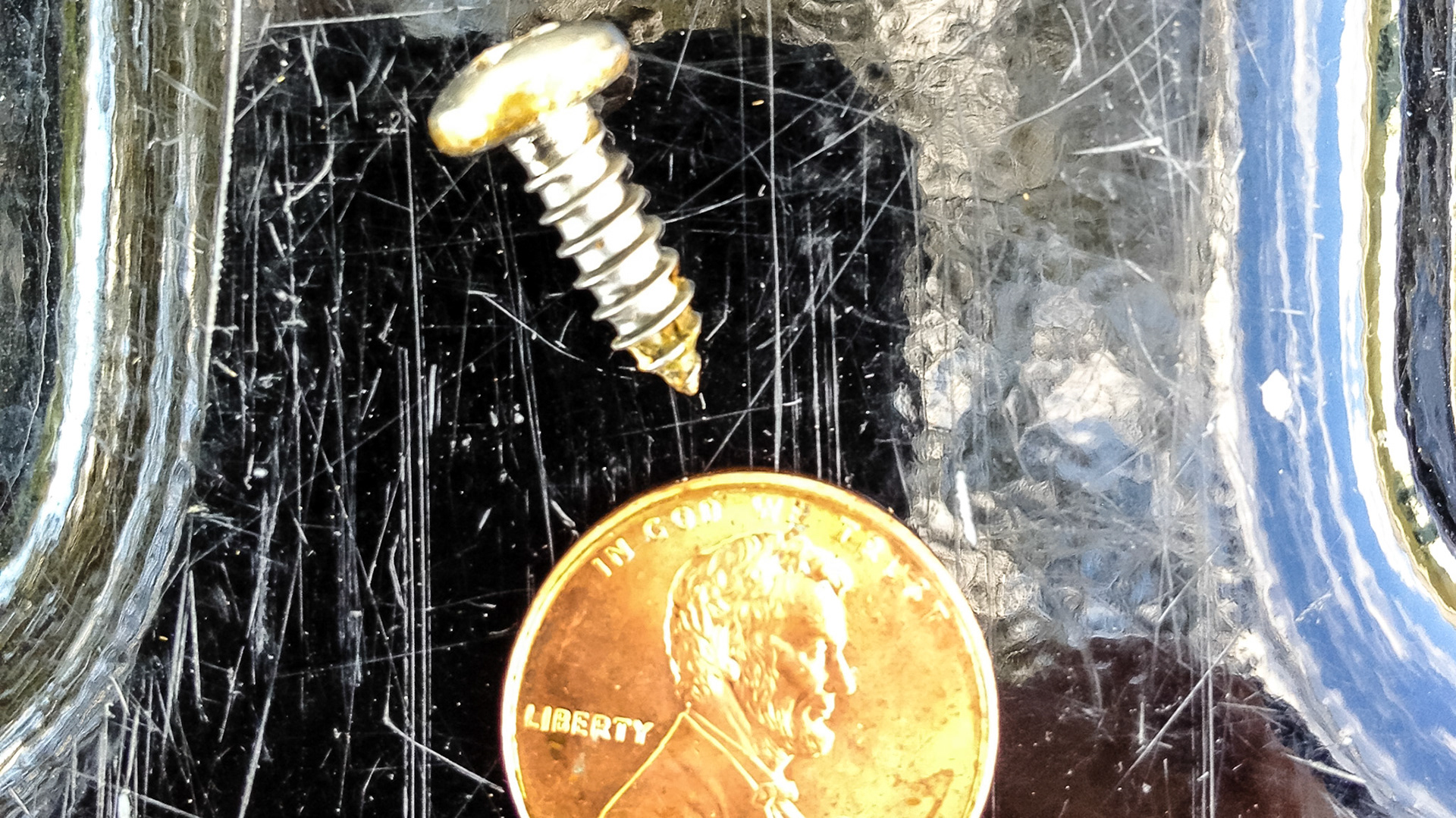 Horse B - This horse had a screw placed between these 2 incisors for an unknown reason and the owner was unaware of it until I floated the teeth.  The horse showed no problems.  However there are indicators of EOTRH that may or may not be associated with this screw. The most likely reason for installing the screw was to reduce cribbing.