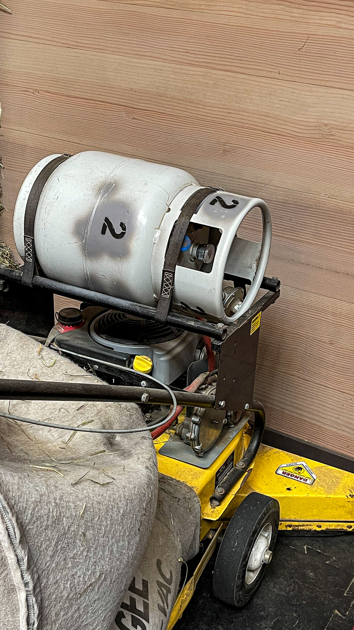 Propane is the fuel used in this model of a floor sweeper. No electric cord is required.