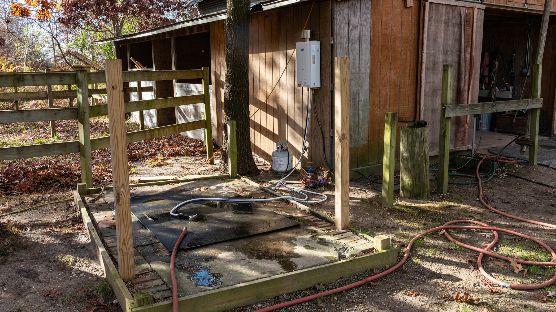 This well made wash rack will never have mud as the bricks allow for the water to drain away into the sandy soil. There is a propane driven instant hot water heater mounted on the barn wall that is fed from the hydrant at the barn door.