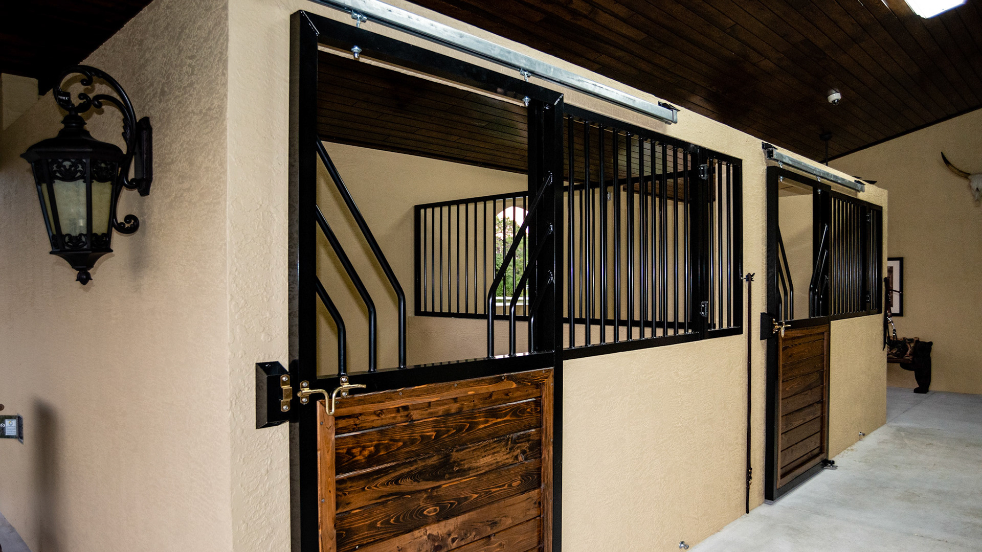 Sliding stall door with a simple right angle latch.
