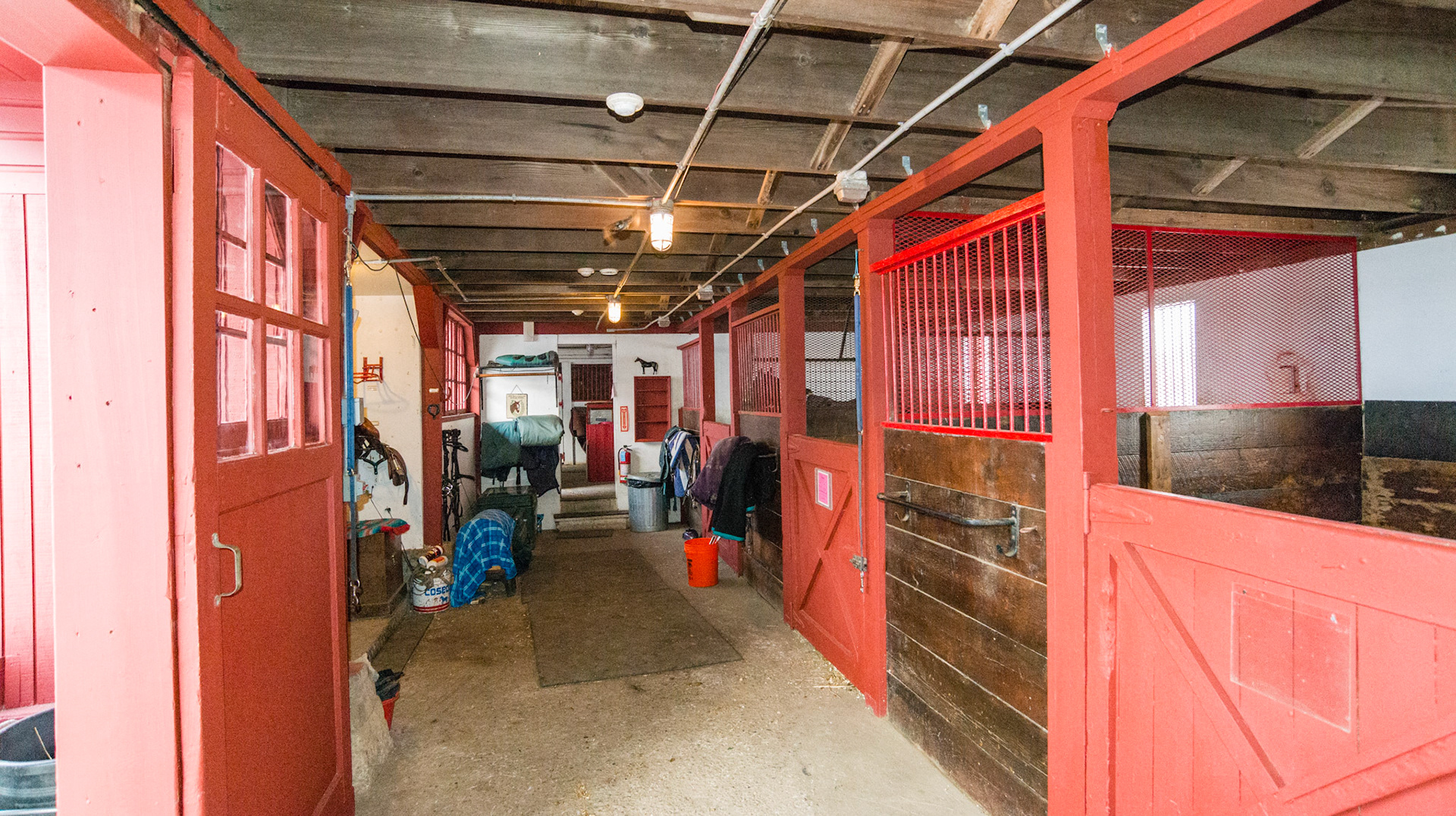 Stall interior in NY - Fire sensors on the ceiling. All electric is in conduit.