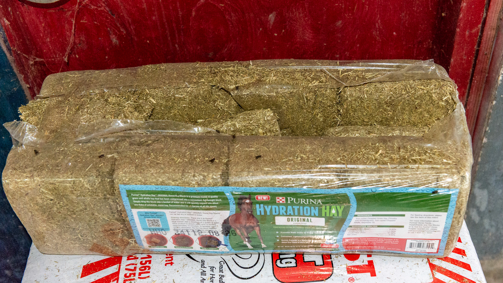 Dehydrated "Hydration Hay (Purina). 1 block per 5 quarts (minimum) of water = 1 block of "quality Timothy and Orchardgrass hay plus alfalfa" weighs 2 pounds and equals 2 pounds of baled dry hay.