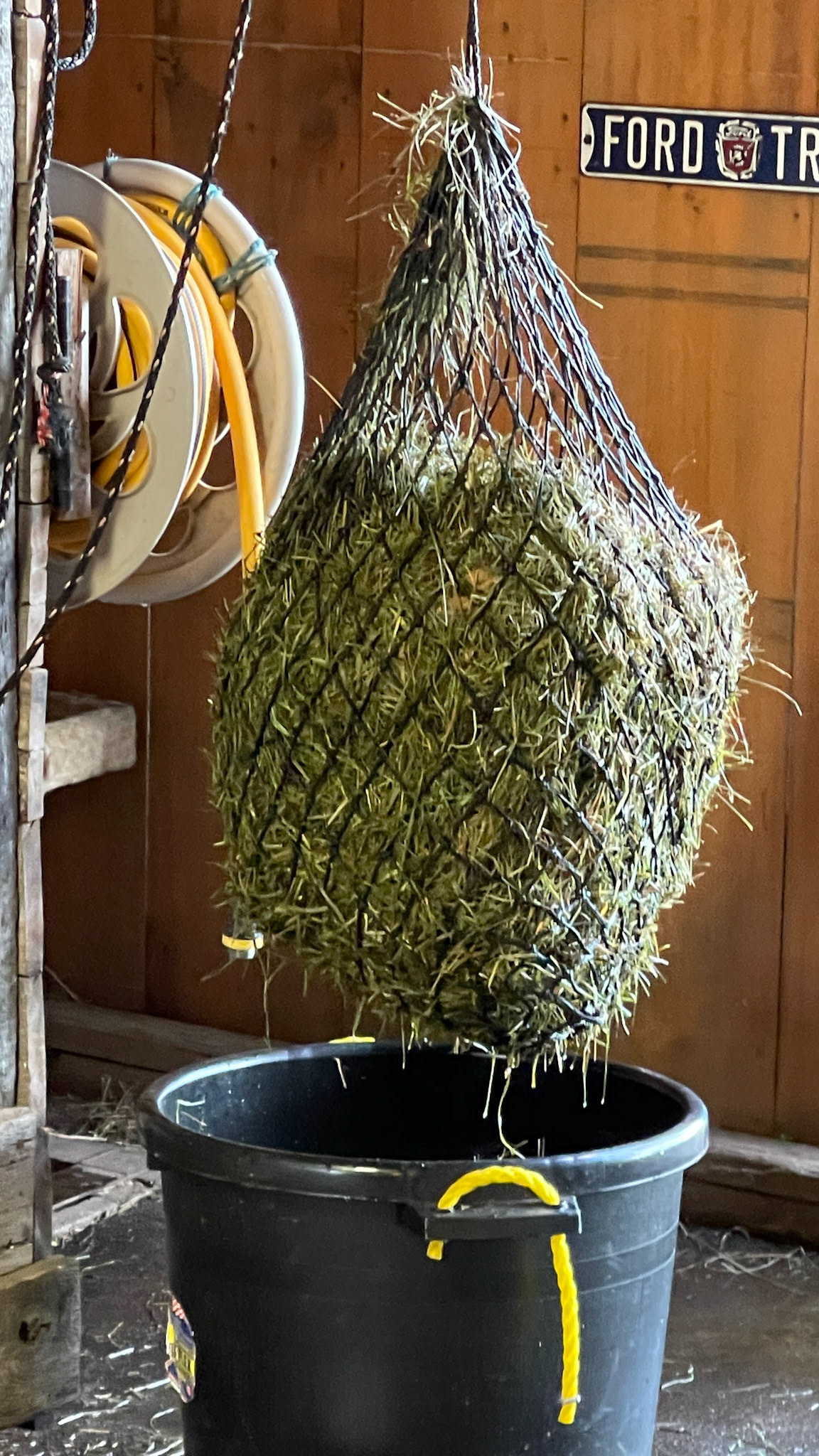 A rope winch system for raising and draining soaked hay.