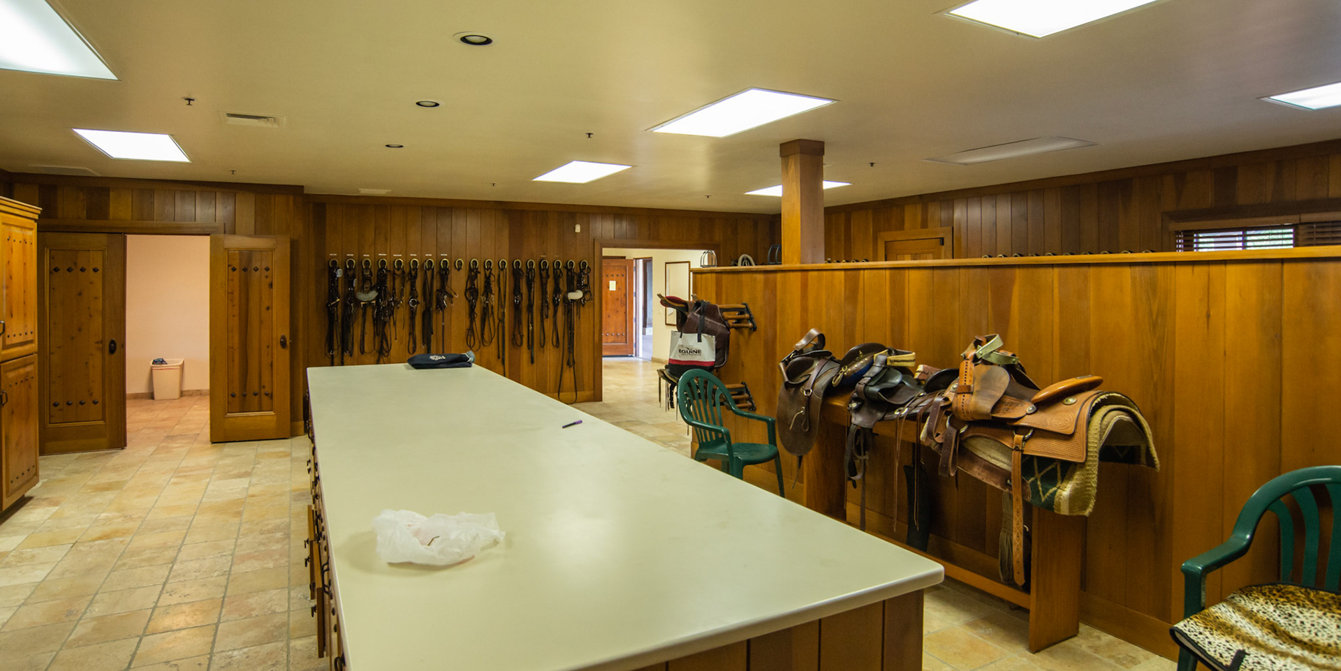 A huge tack room in a Wellington, FL barn. the laundry room is adjacent.