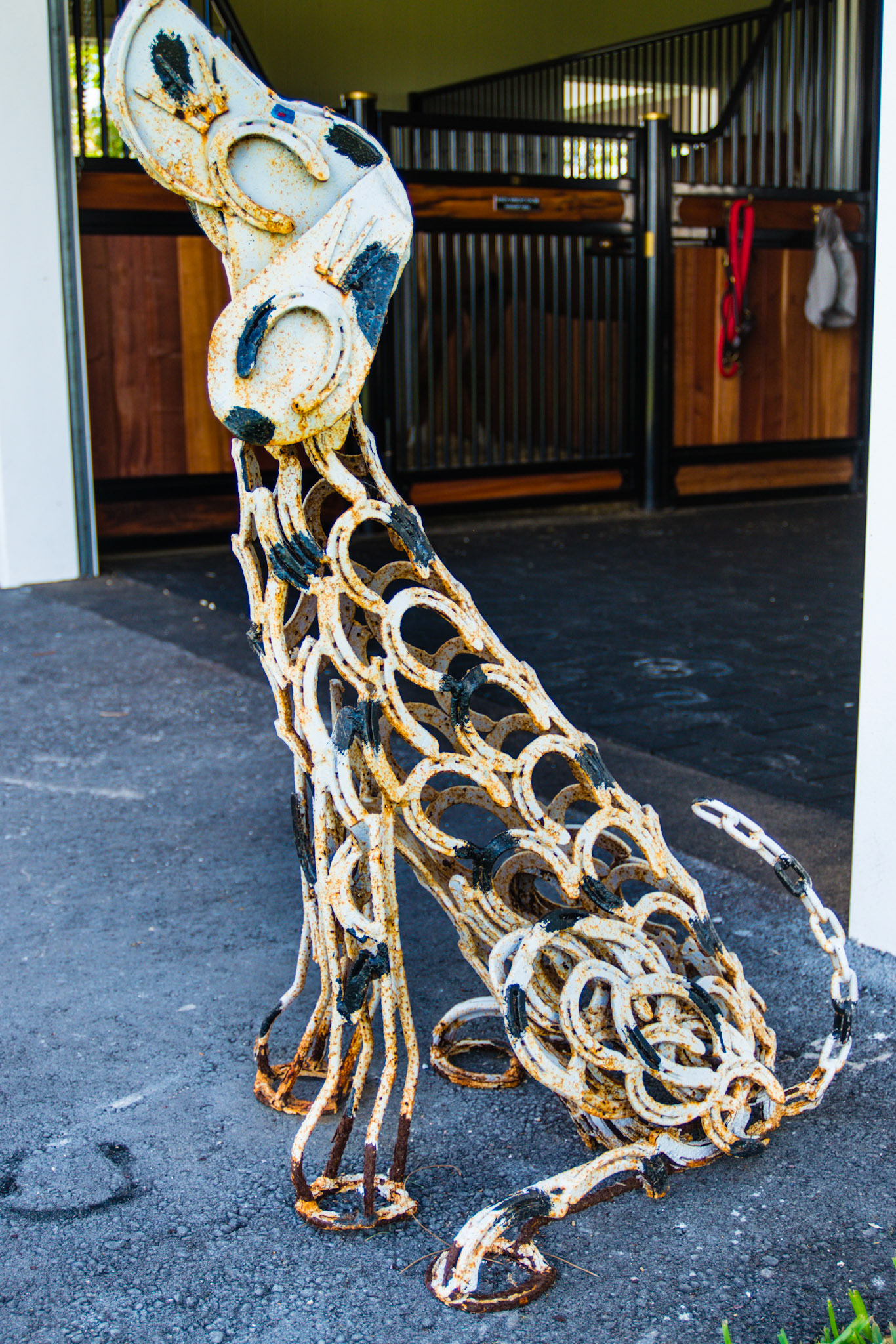 A dog made of horse shoes
