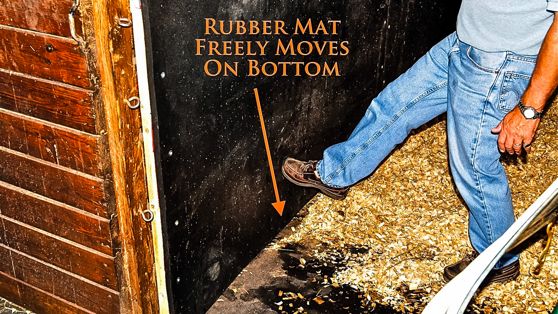 Usually kick mats are screwed or glued directly to the wall. This man’s idea was to buffer the kick by placing the mat away from the wall. He eventually removed it because the shavings worked their way up behind the mat.  Maybe if the bottom edge was about a foot off the ground it would not have been a problem. I thought the idea was good to prevent injury to the horse.