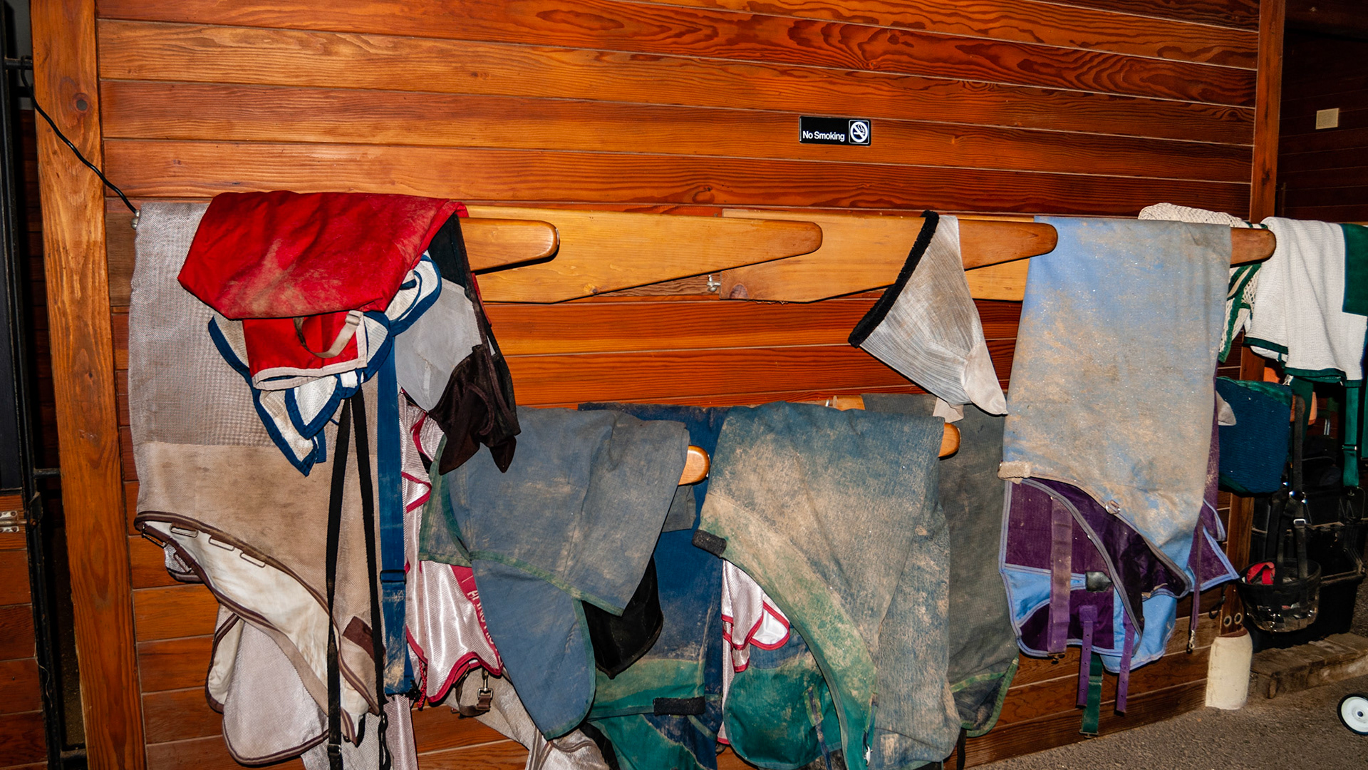 Blanket racks fold out of the way when not in use