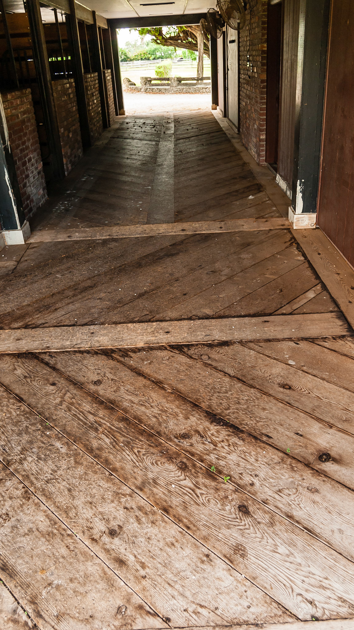 A wood floor in a herringbone pattern.  These floors can become very slippery.