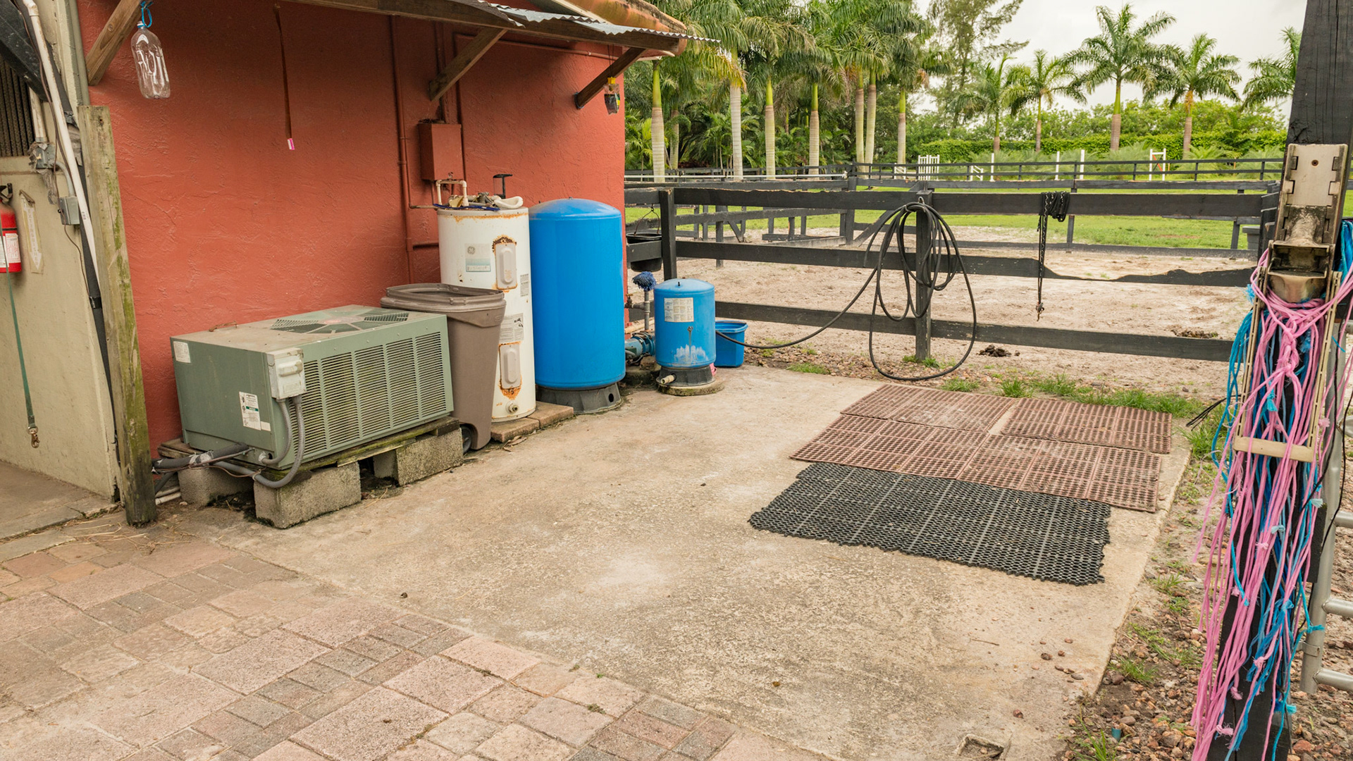 Horse in this area is exposed to the water pump, water storage, water heater, and air conditioner unit.