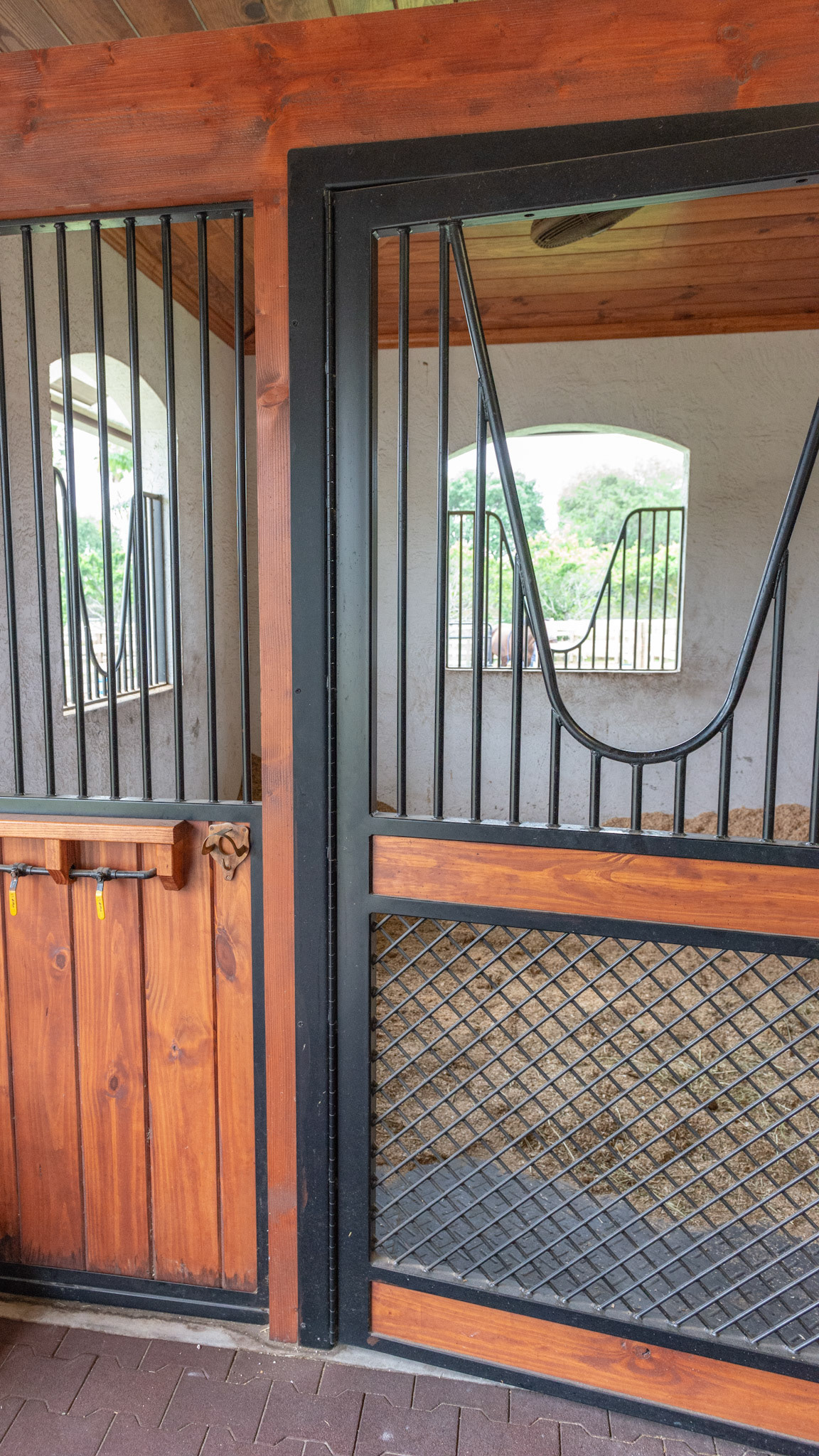 Piano hinge for a stall door.  Note the steel air vent in the lower half.