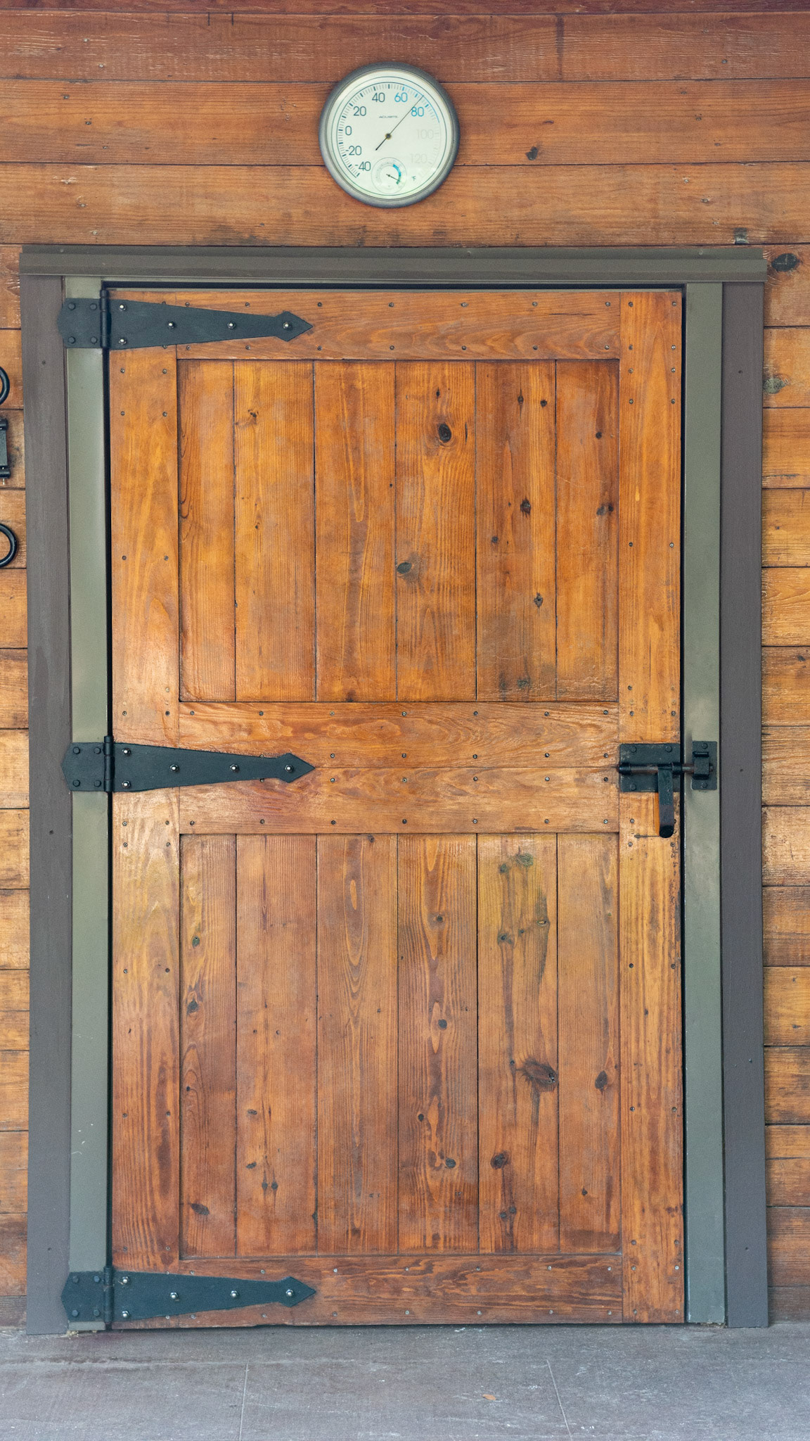 Custom door leads to the feed and laundry room