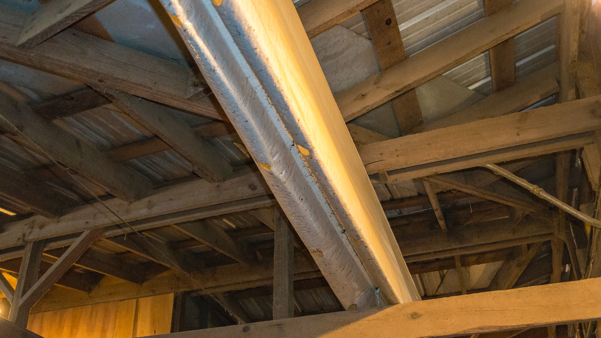 Overhead tube force air ventilatuin system in Alpharetta, GA - it is collapsed because the fan was not on.