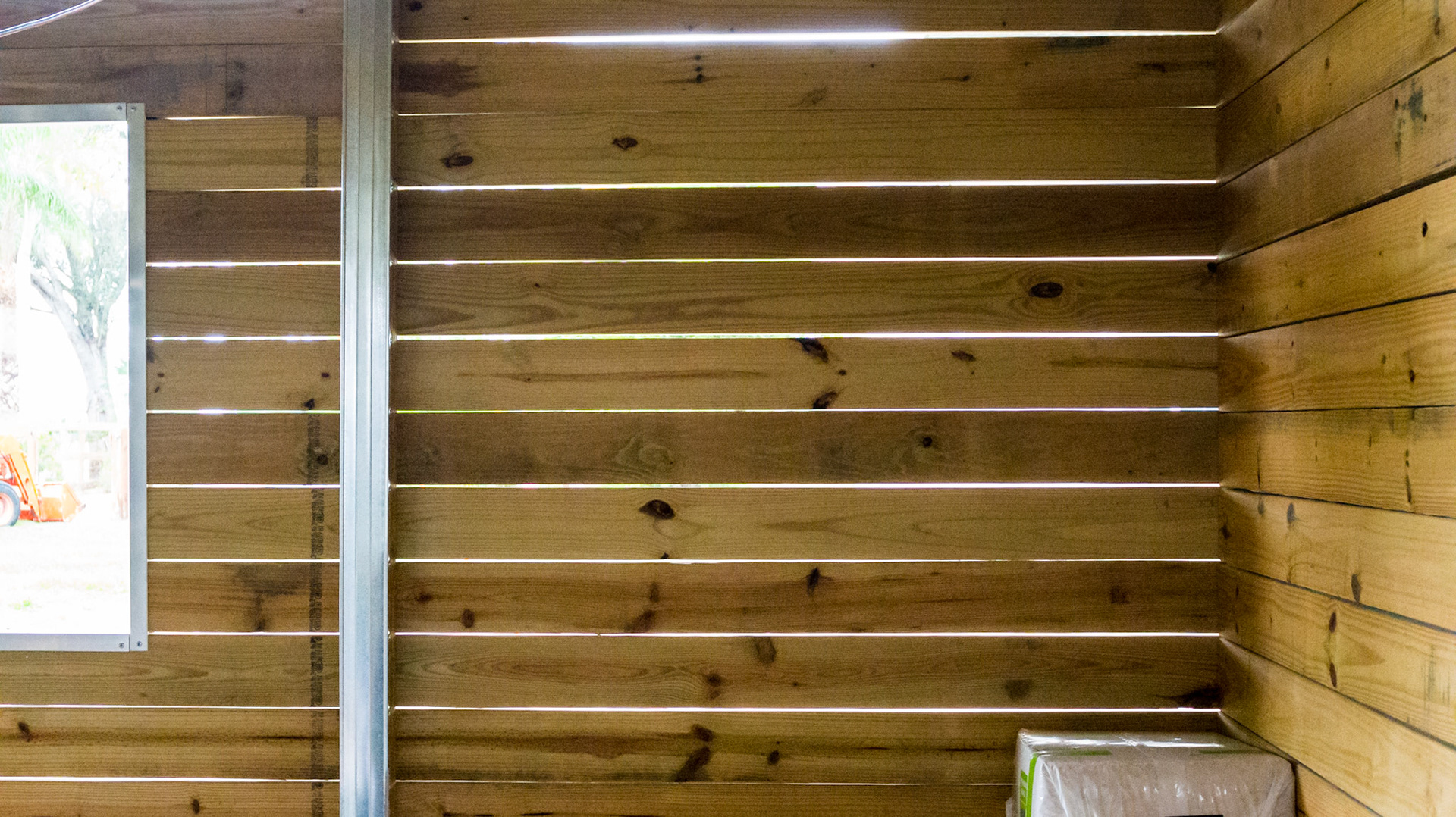 Metal trim in a brand new barn in Loxahatchee, FL - Outside wall has ventilation slats which is good for this south Florida barn.