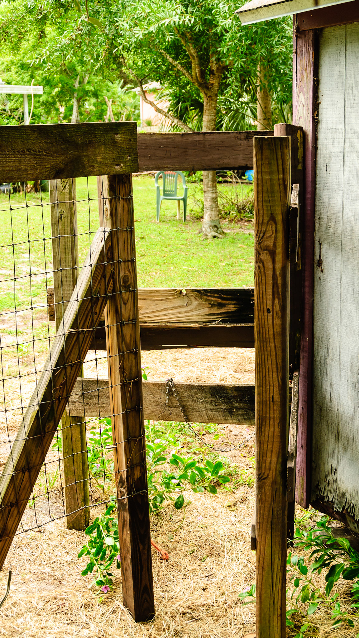 A human pass through gate built into the fence line.