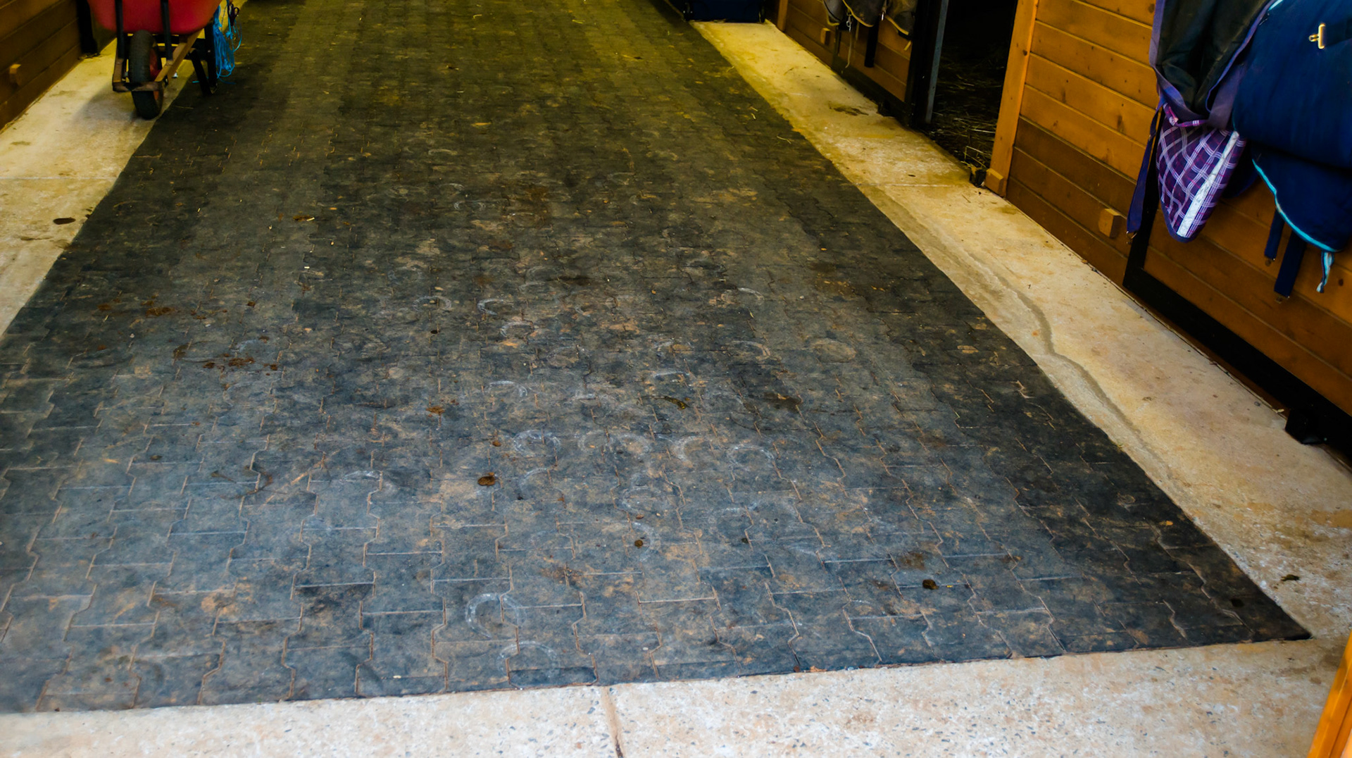 Rubber tiles laid into a cement frame