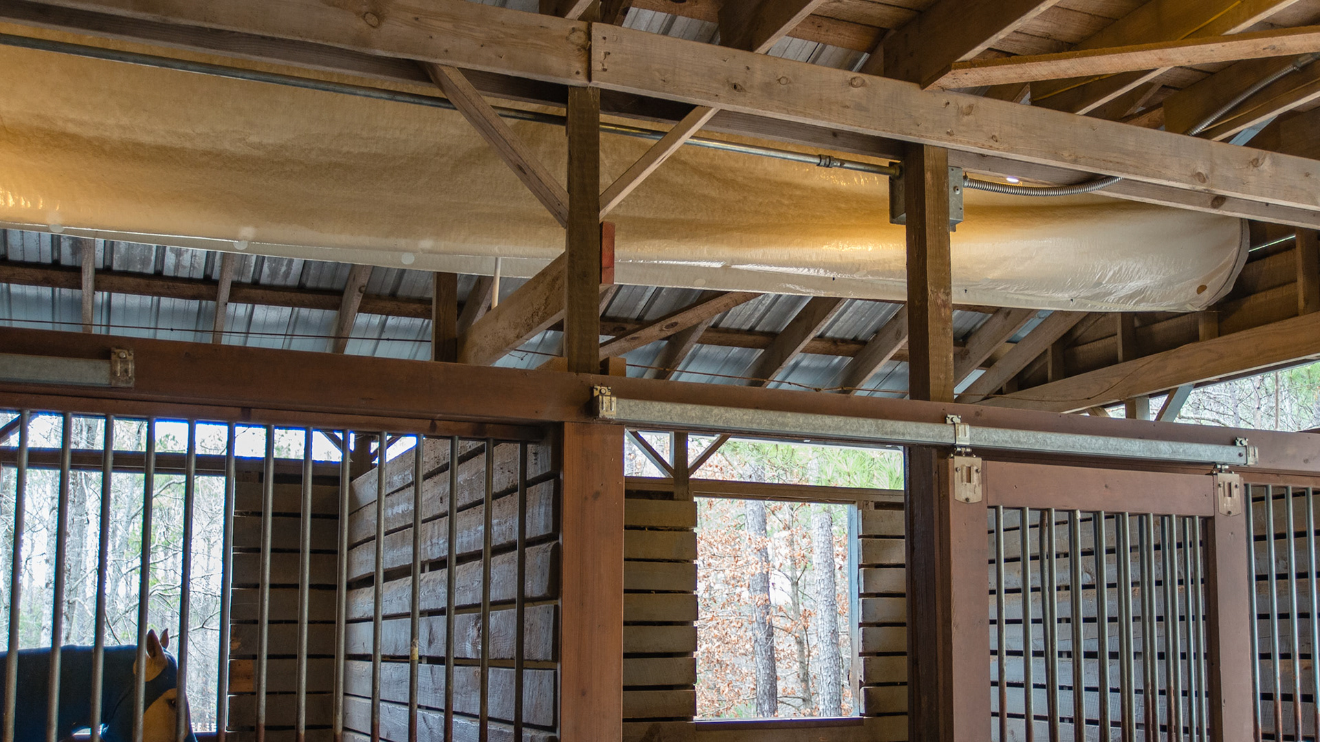 Overhead tube force air ventilatuin system in Alpharetta, GA - it is collapsed because the fan was not on.