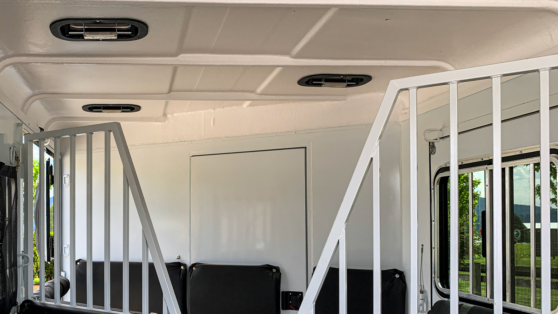 Roof air vents in a fiberglass ceiling.