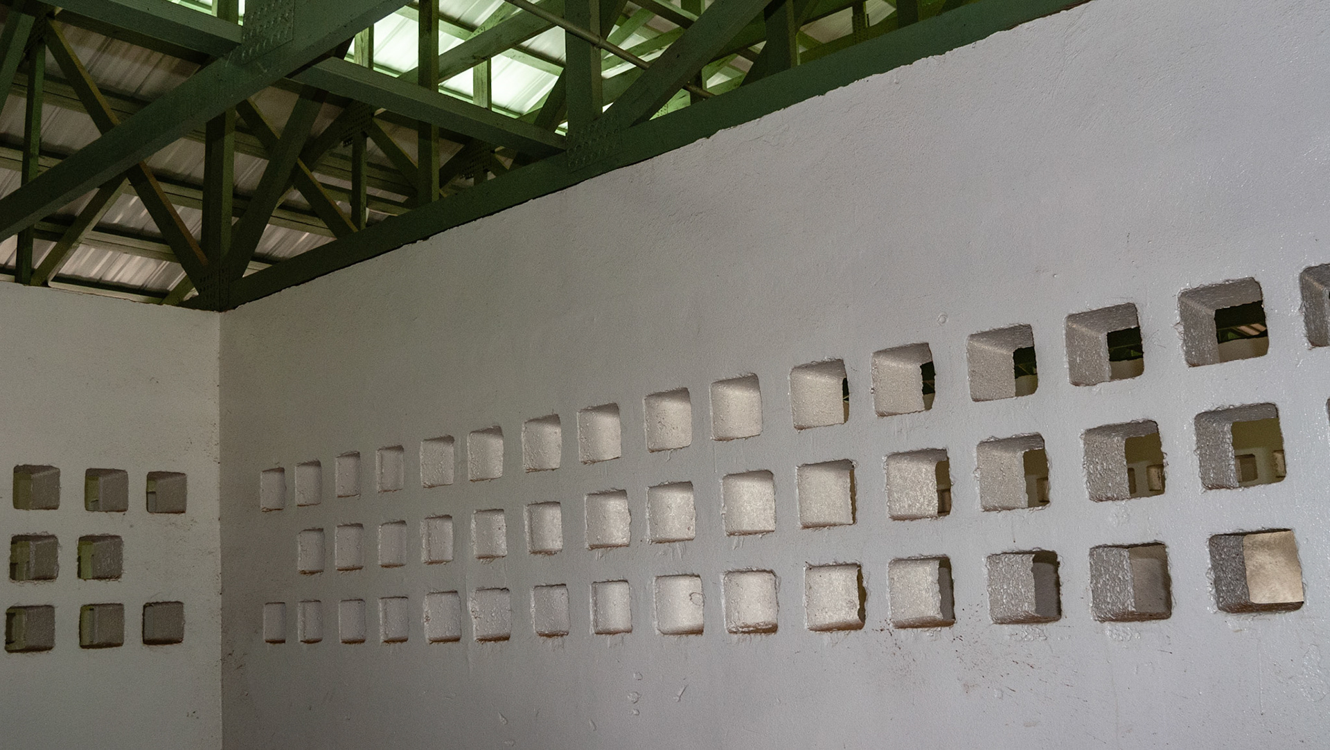 Holes in a cinder block wall for ventilation