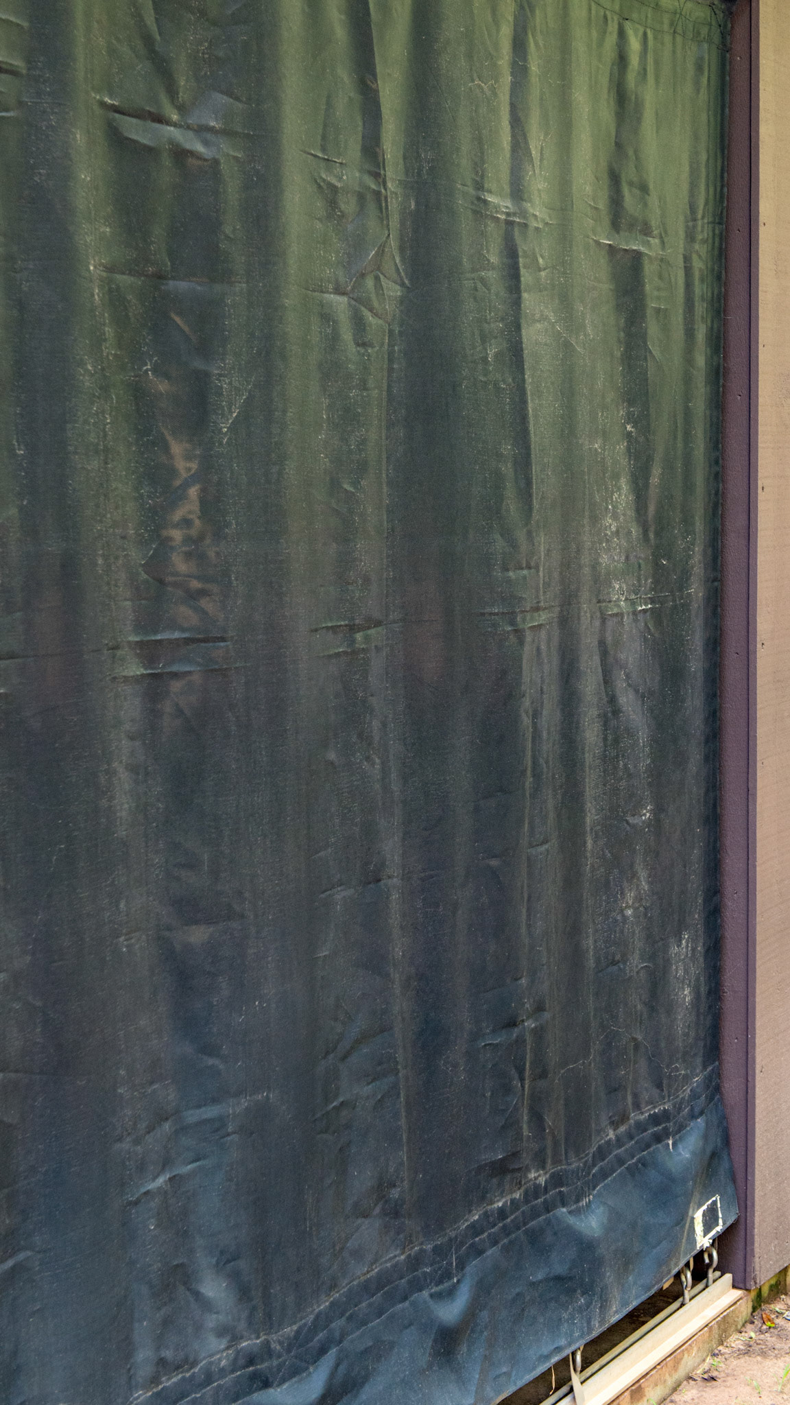 Protective screen lets light and air in but is strong enough to keep wind and flying debris out of the barn. See the close ups for details.