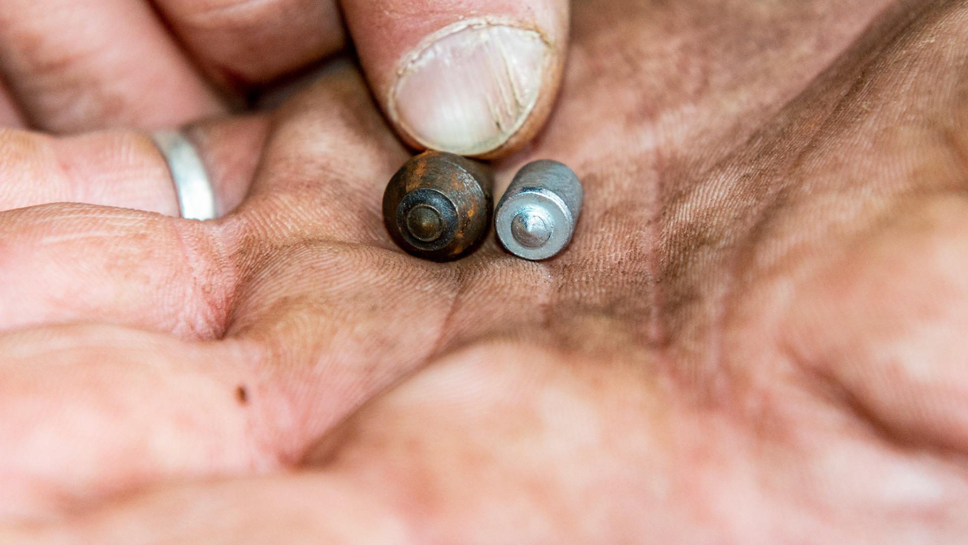Borium in titanium studs (2 types) ready to be installed on winter shoes to prevent slipping on ice. They also work on asphalt.