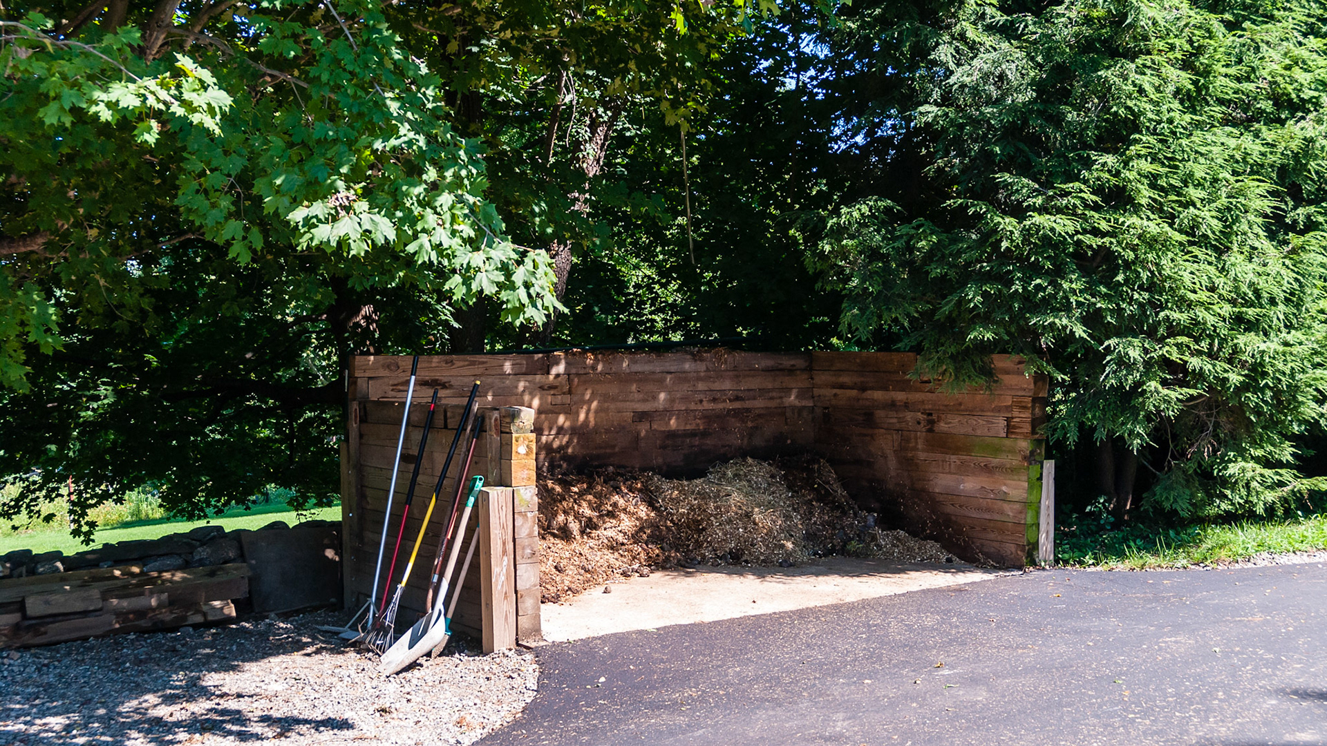 Containment made of 6x6 wood with a cement floor.
