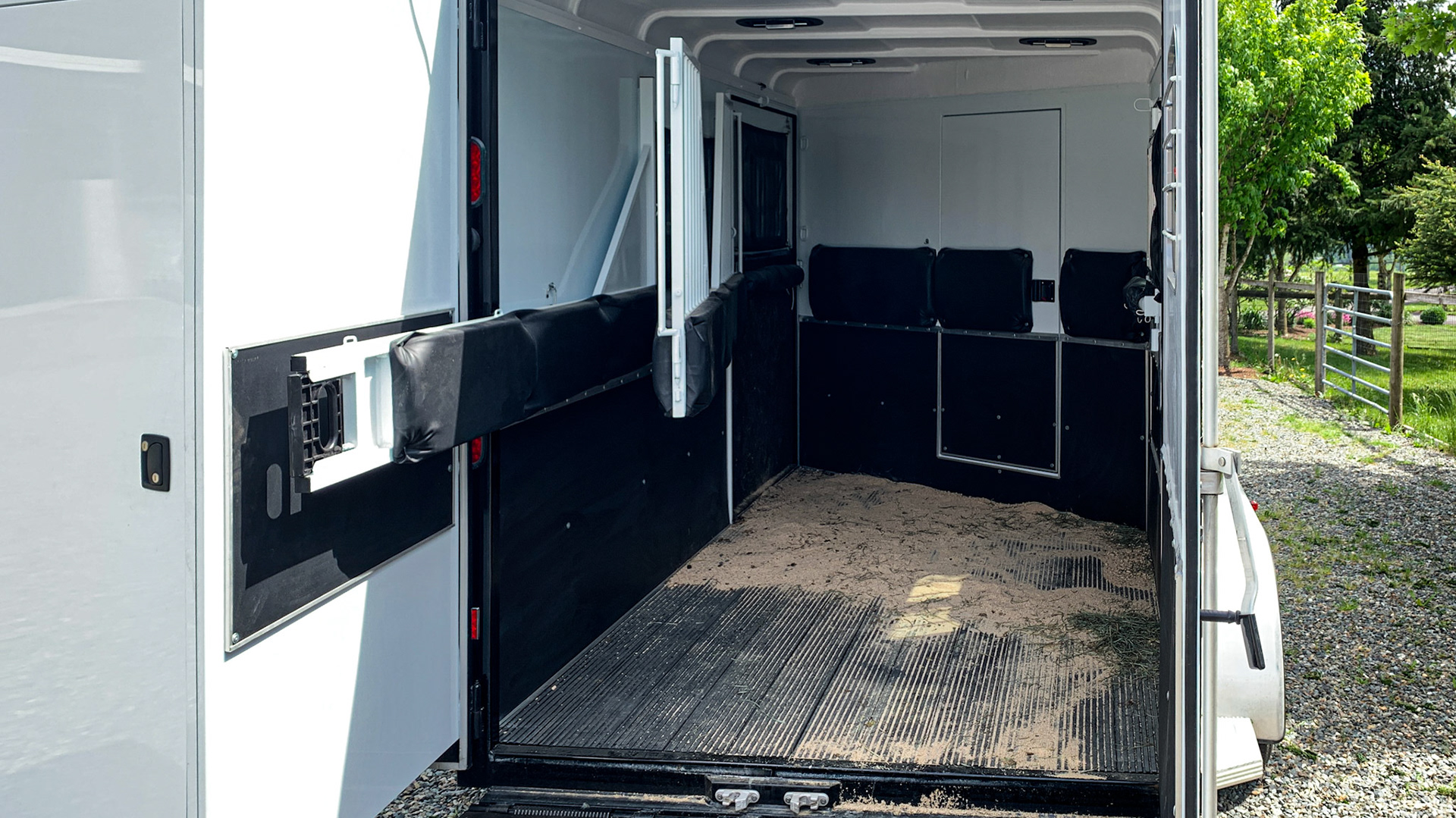 Another interior view with the front door closed.  Note the door to gain access to the front storage area in the nose and the closed door to the tack area incorporated into the rear swinging door.