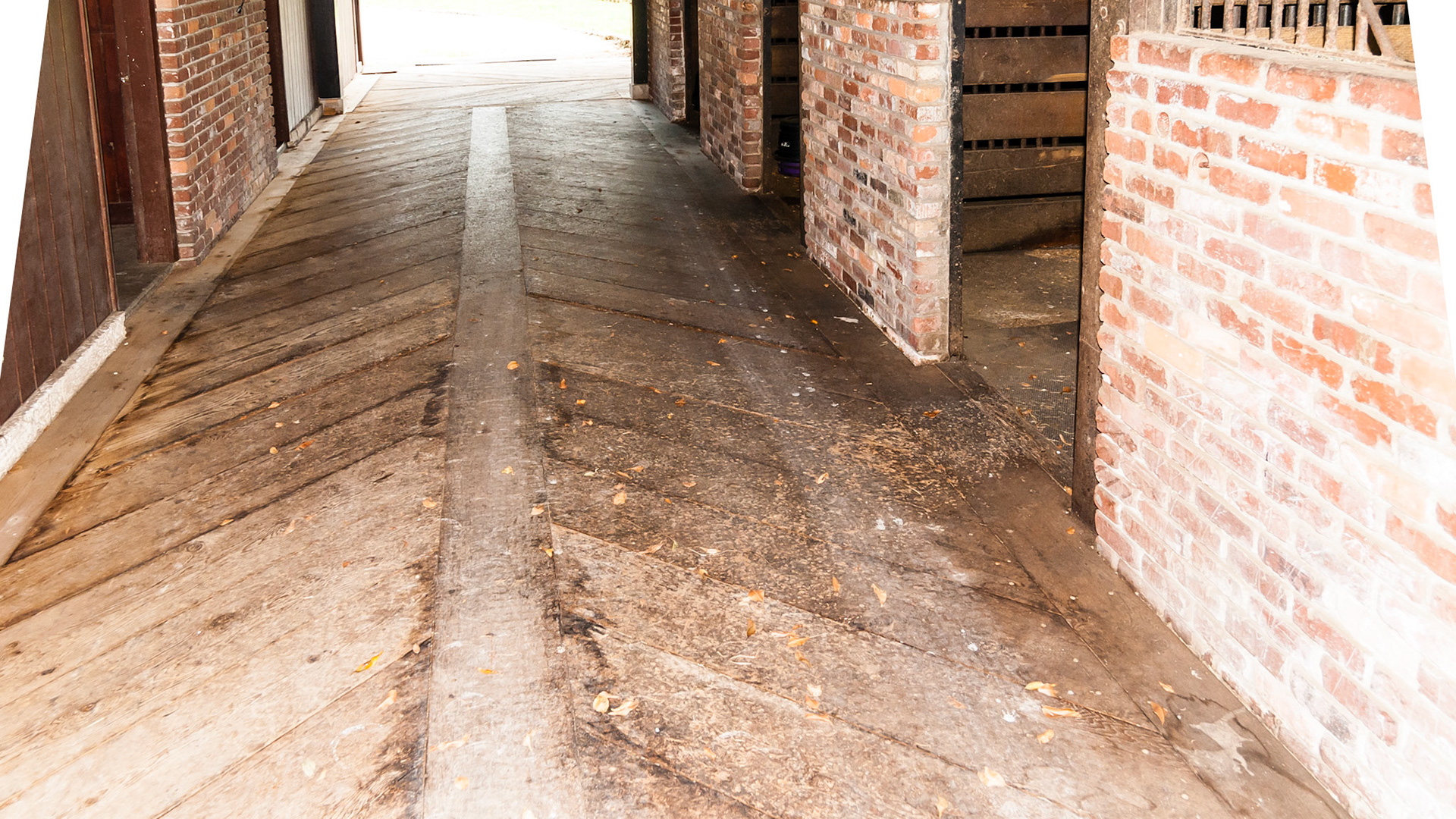 A wood floor in a herringbone pattern.  These floors can become very slippery.