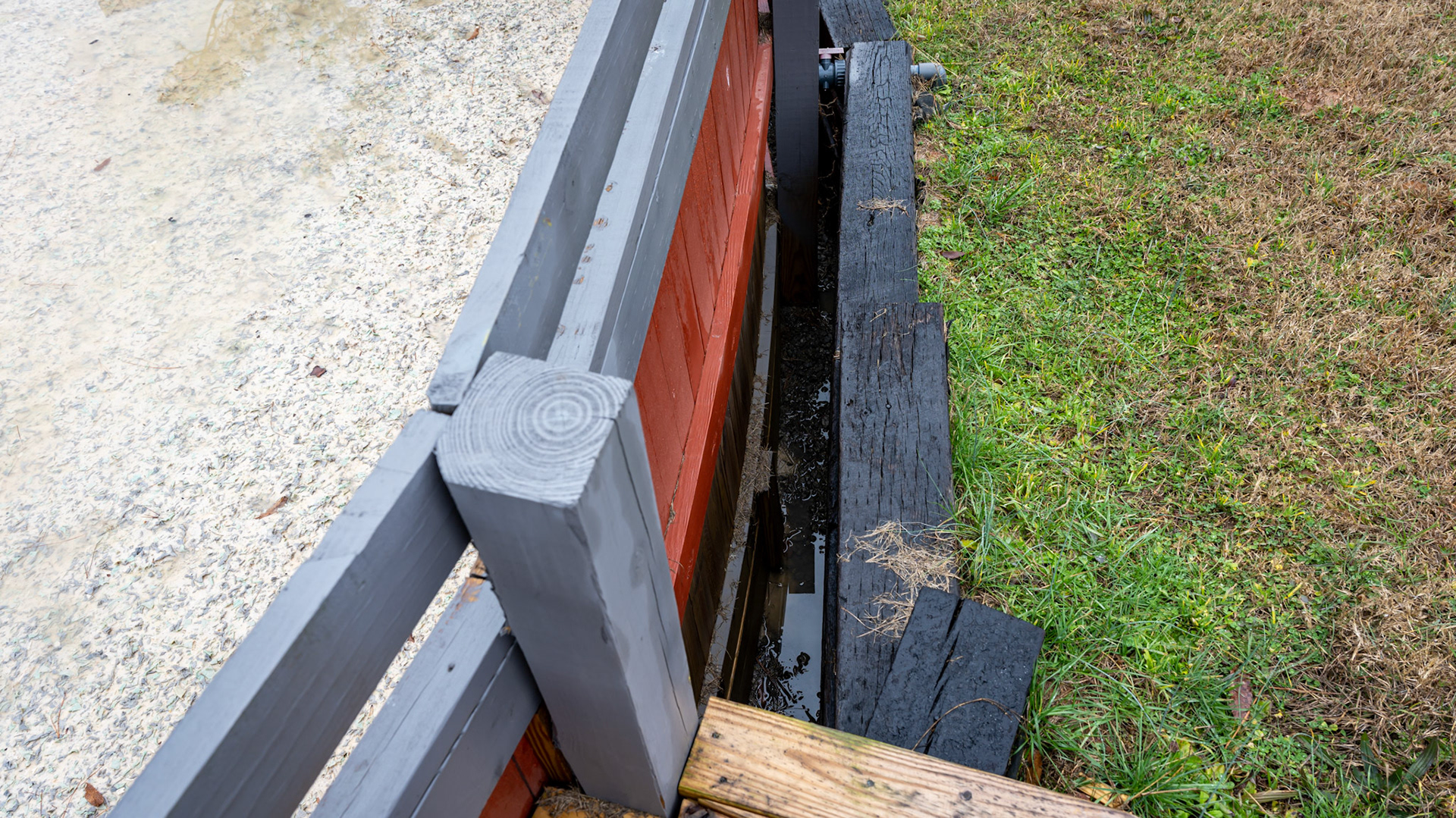 Various views of a round pen built into a hillside.