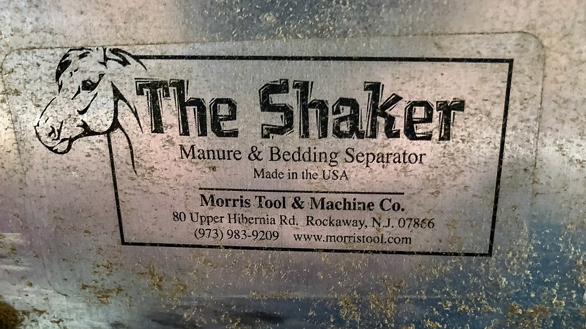 The Shaker is a noisy device run by a high speed drill that sifts the dirty shavings allowing the small dry flakes to fall back into the stall while the larger manure balls roll into the wheel barrow.  With a bit of time, the wet flakes become dry.