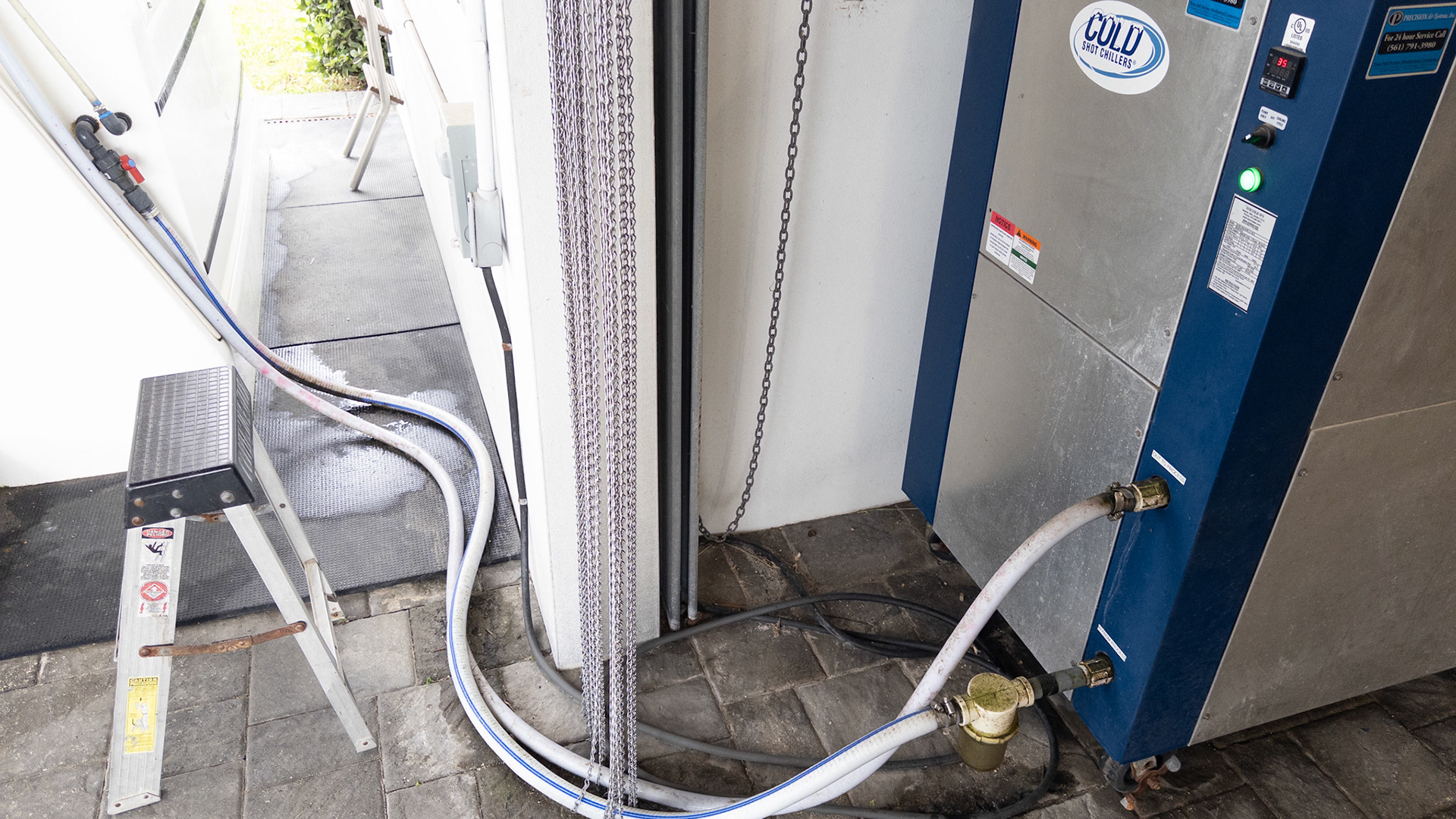 This water-chilling unit provides near-ice temperatures to an outdoor water treadmill (Equinespa) in FL, providing resistance without a load to injured horses in recovery.