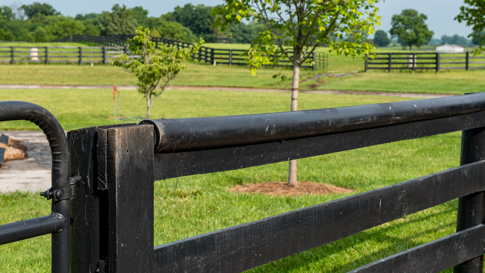 PVC pipe is cut and attached with screws to the top board to prevent wood chewing. The ends are sealed. The owner says this system works very well.