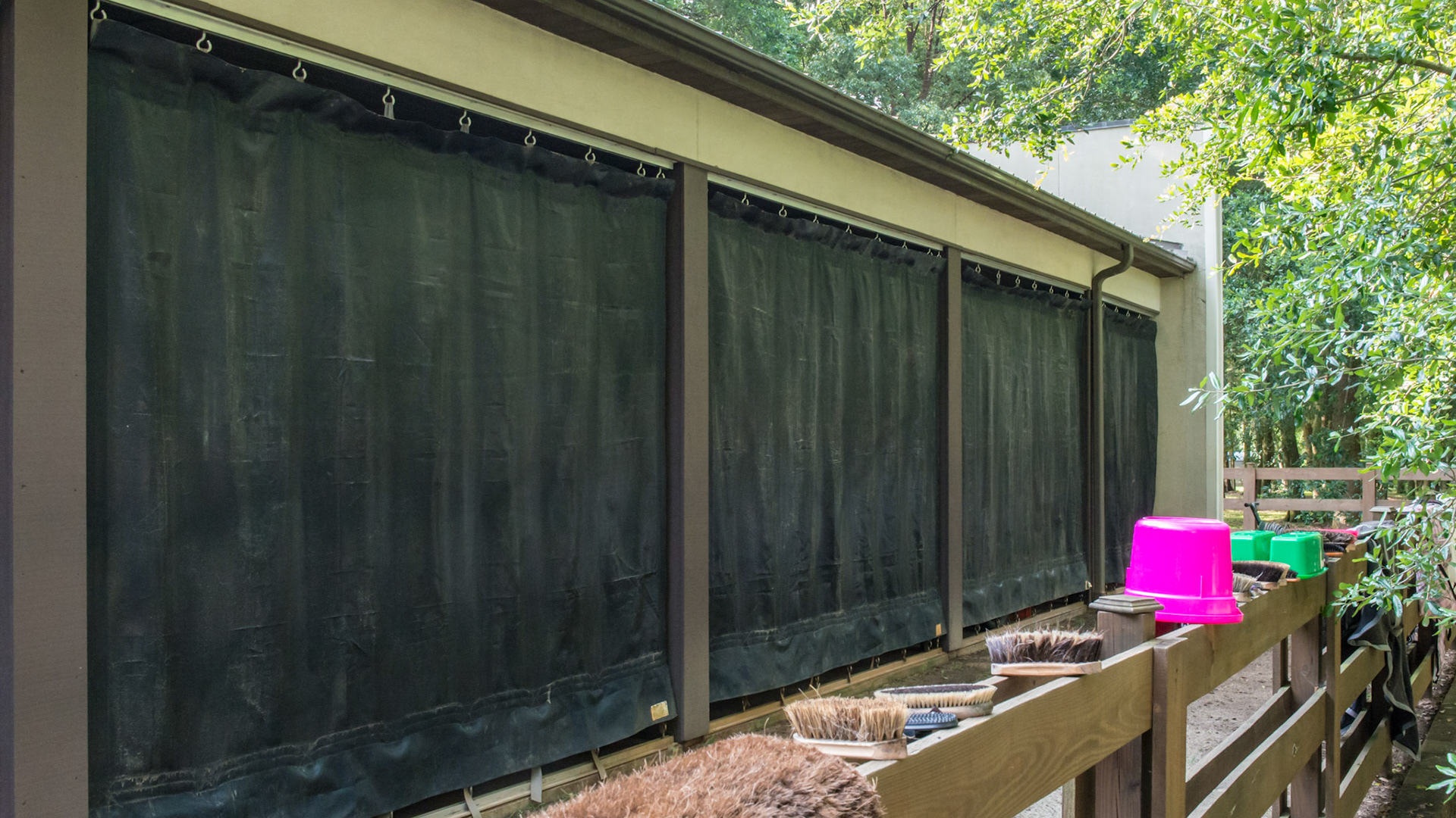 Protective screen lets light and air in but is strong enough to keep wind and flying debris out of the barn. See the close ups for details.