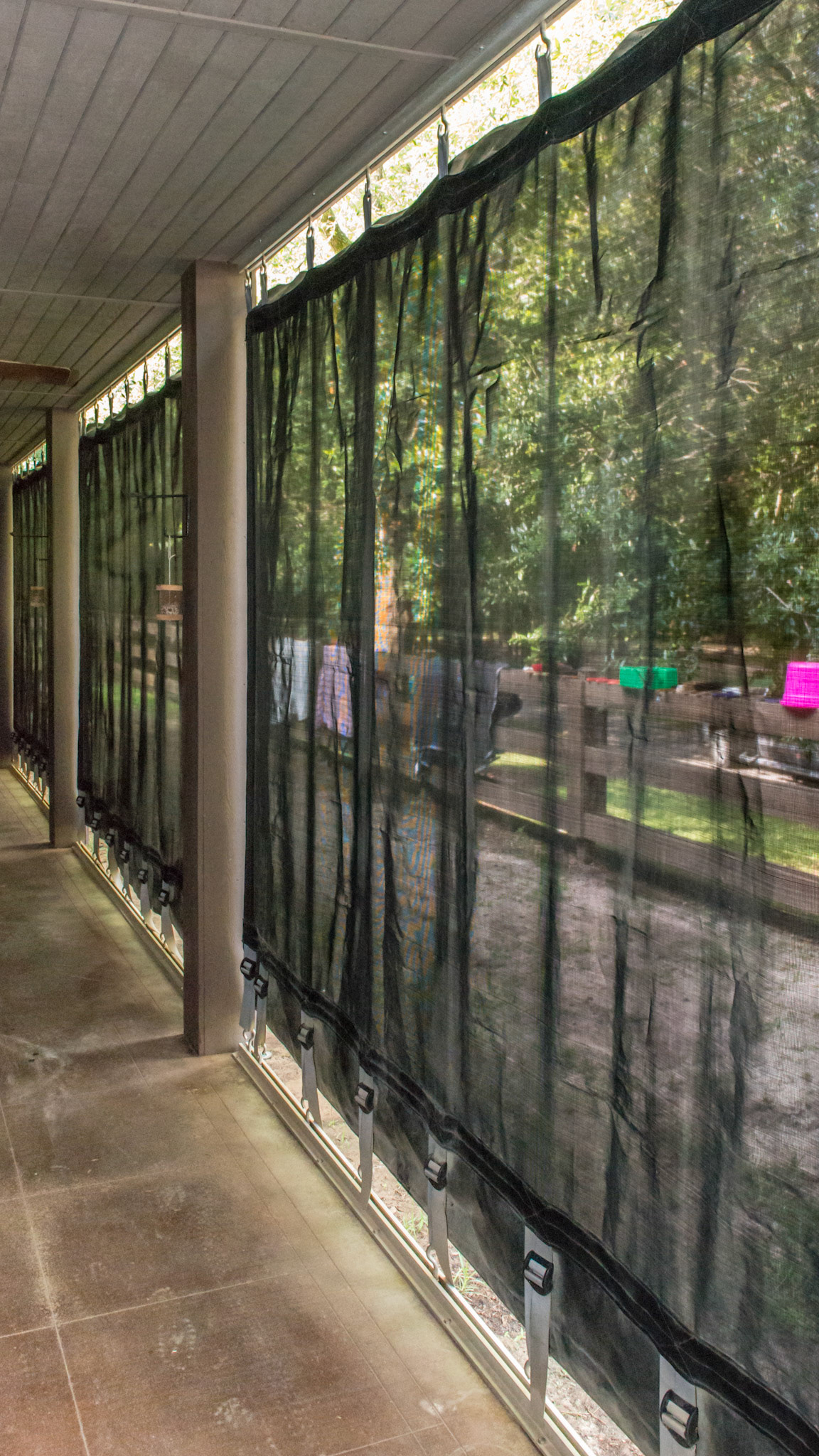 Protective screen lets light and air in but is strong enough to keep wind and flying debris out of the barn. See the close ups for details.