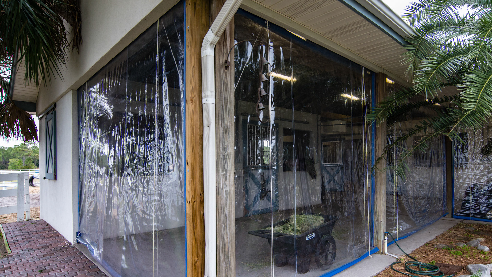 Custom made roll up clear vinyl wind protection in Pensacola, FL