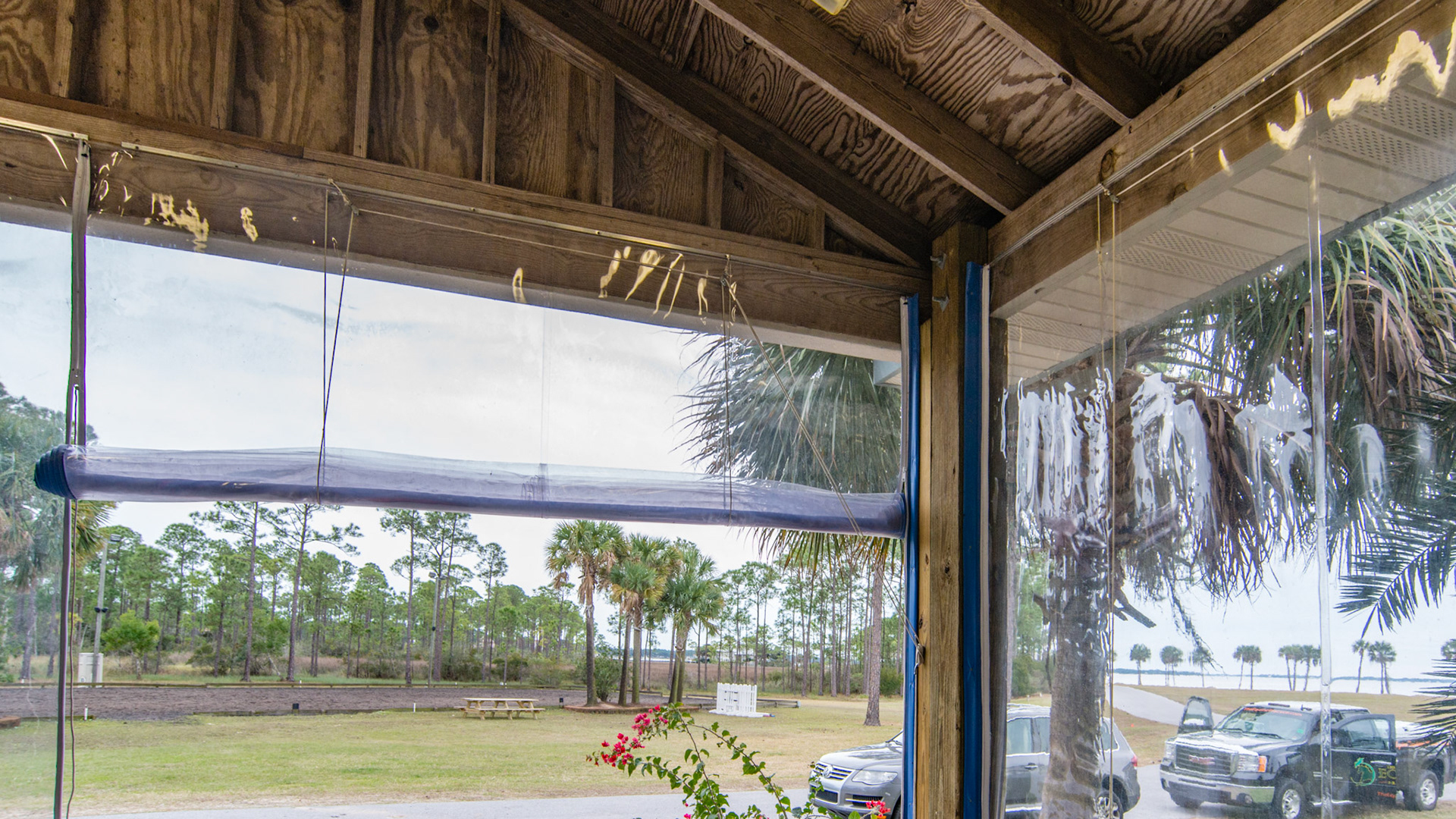 Custom made roll up clear vinyl wind protection in Pensacola, FL