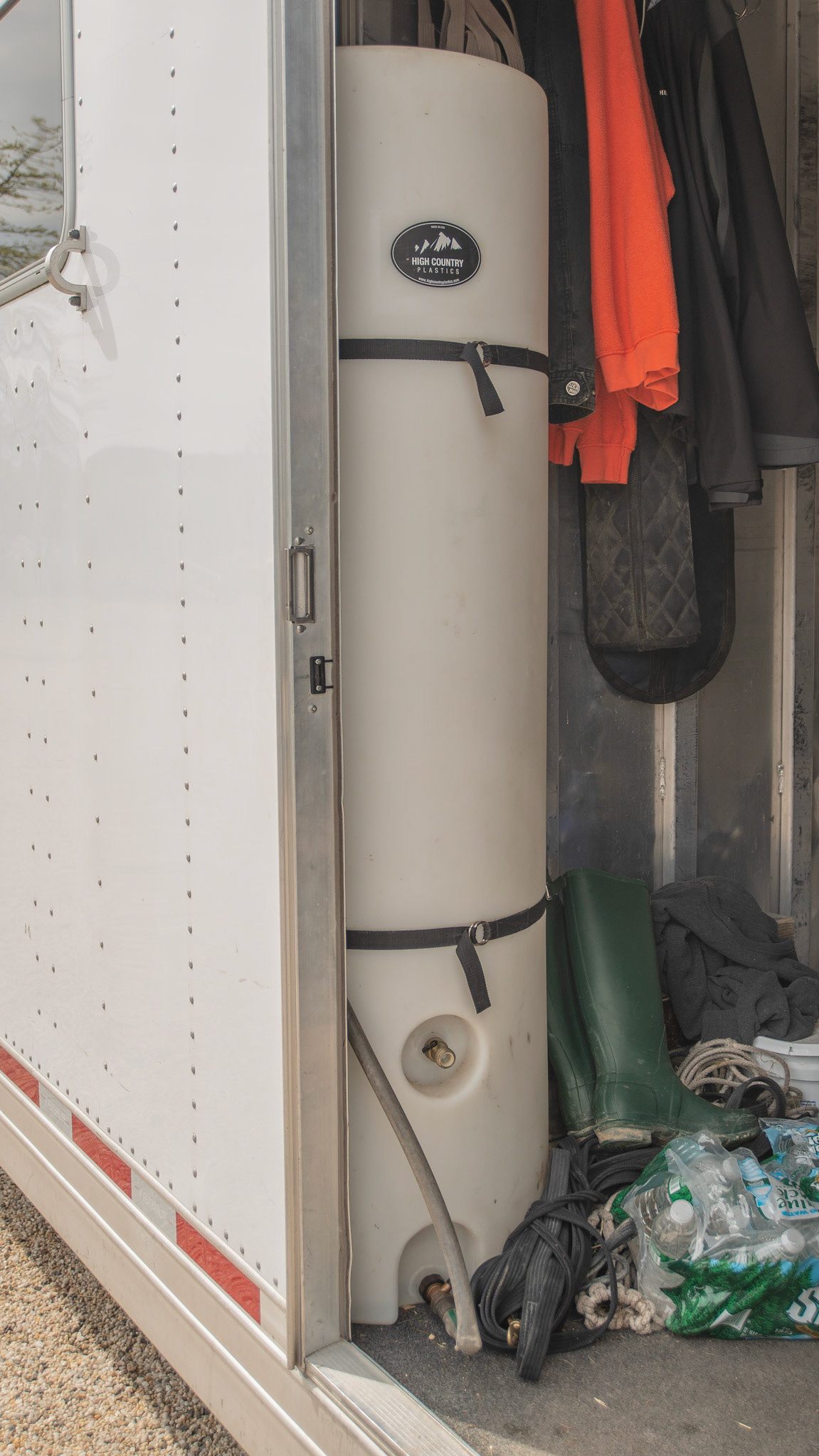A water tank installed in this horse trailer assures the traveling horses their water supply goes with them.