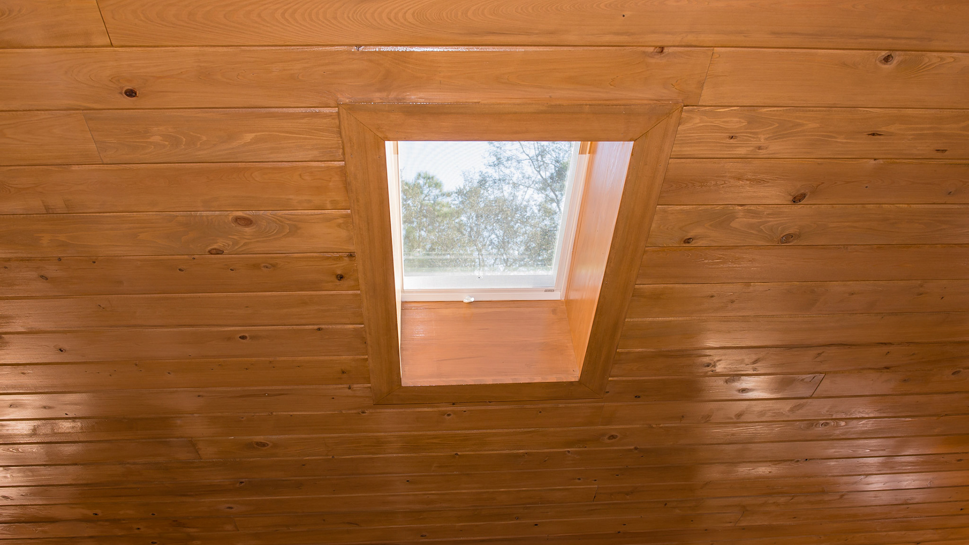 Roof vents can be opened using a connecting pole attached to the loop handle.