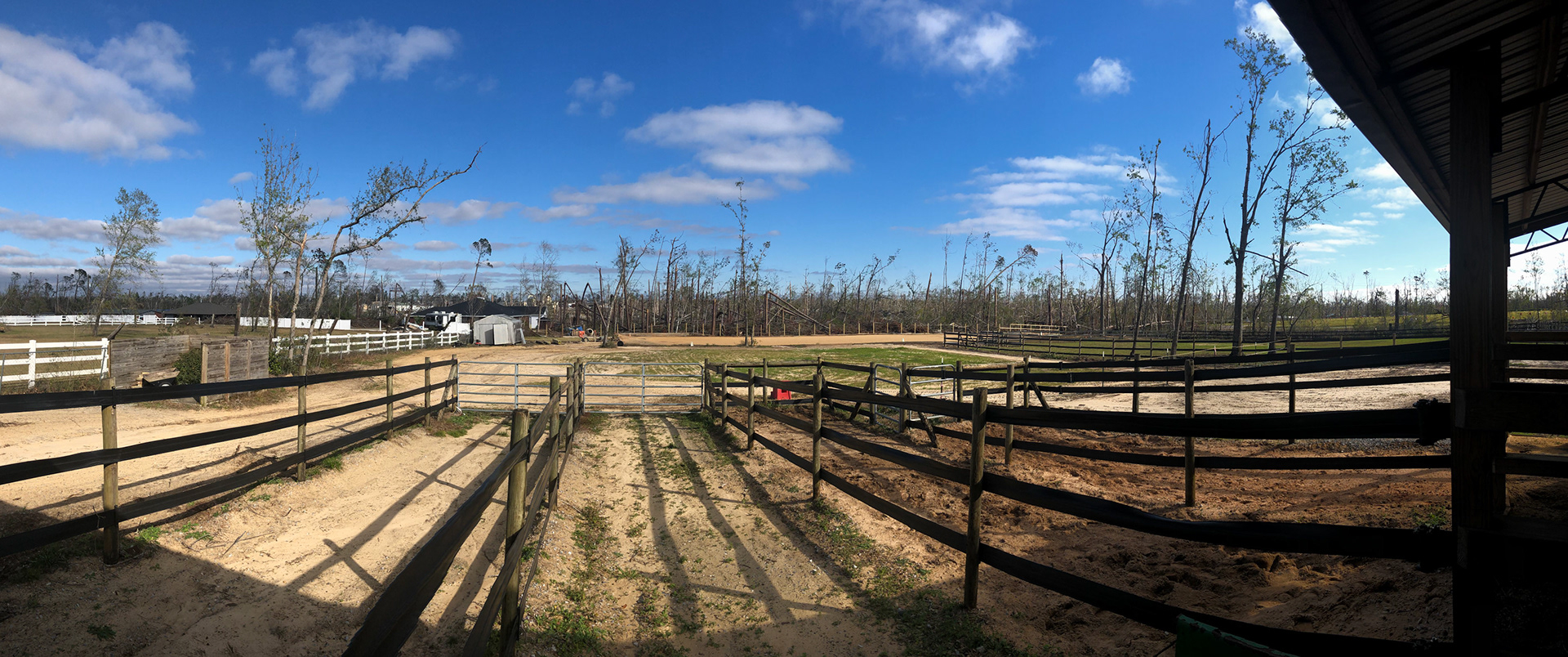 AFTER: This barn in Panama City, FL was hit by a severe hurricane.  See the trees in the before pictures and the wasteland missing trees and wide open spaces which were once wooded lands.  Amazingly, the barn was untouched.