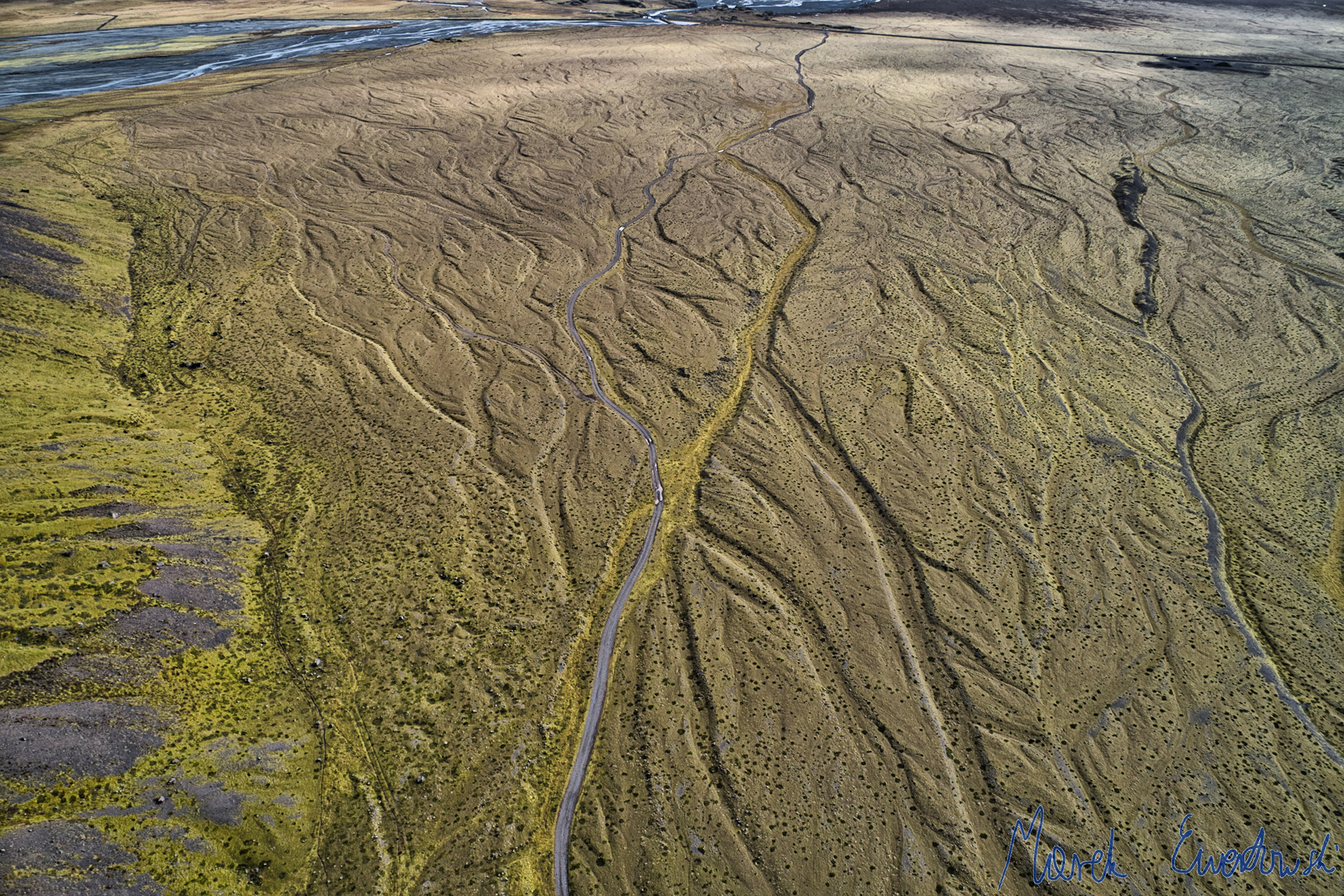 Meltwater channels created a half-century ago and later abandoned as ice margin retreated. Breiðamerkursandur, Iceland.