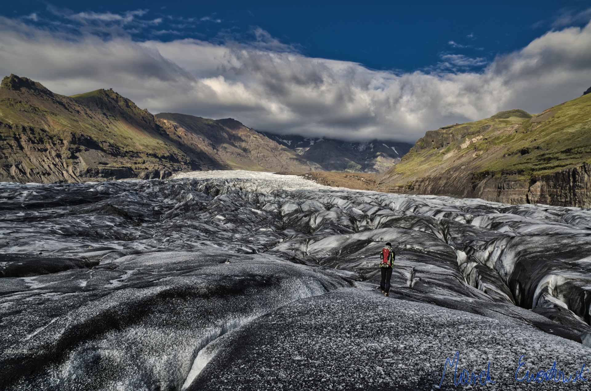 Crossing a glacier makes human being small and humble. It is also the only way to obtain valuable glaciological knowledge about glacier behaviour and response to climate changes. Svínafellsjökull, Iceland.