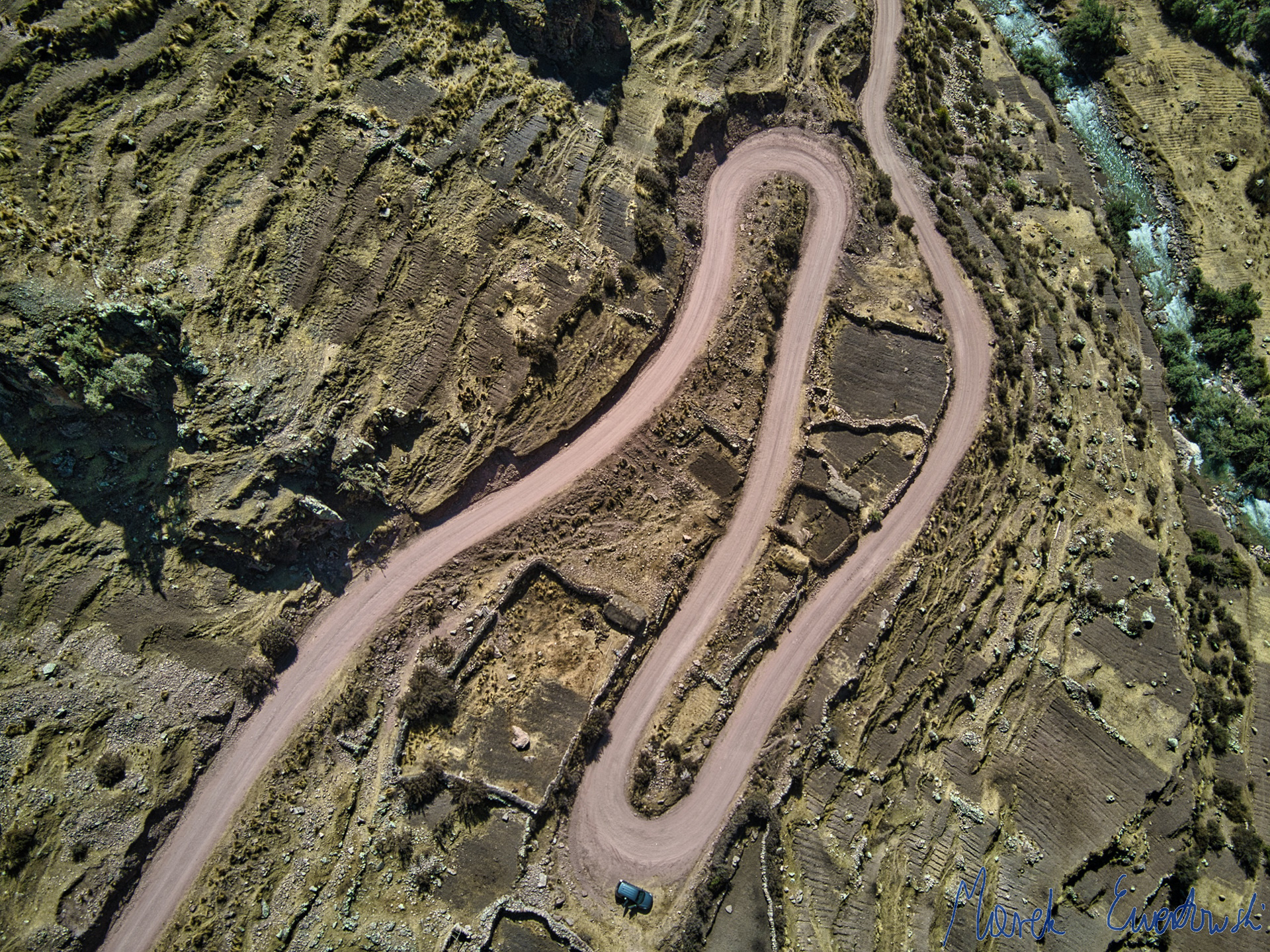 Over the last few years, the Peruvian government put a tremendous effort into development pf mountain roads in the Andes. Implications for local communities and their lifestyle are even more complicated. Cordillera Vilcanota, Peru.