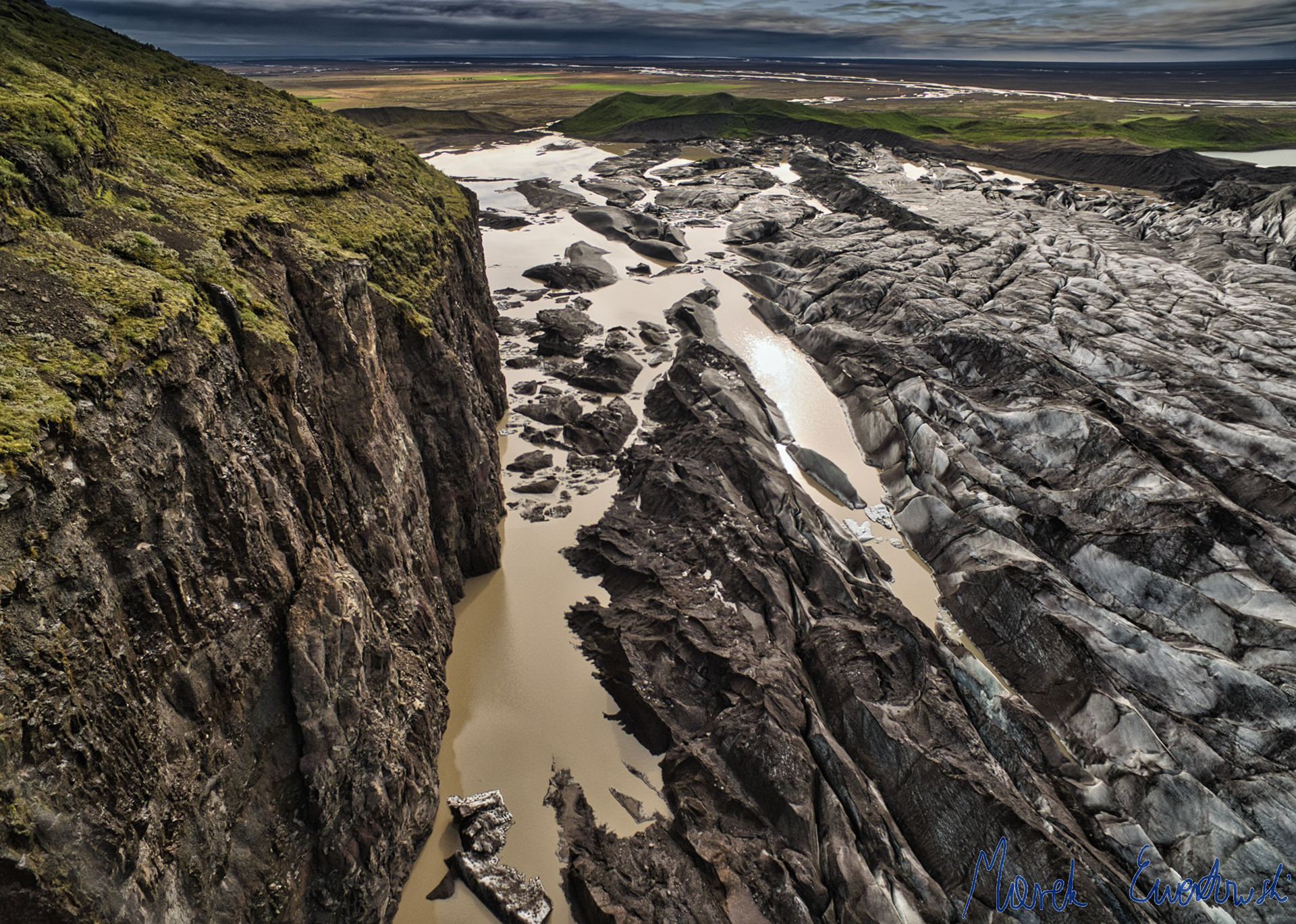 Many glaciers in southeast Iceland retreats into theirs overdeepenings, which results in the development of floating ice snouts and glacier lagoons filled with icebergs. Svínafellsjökull, Iceland.