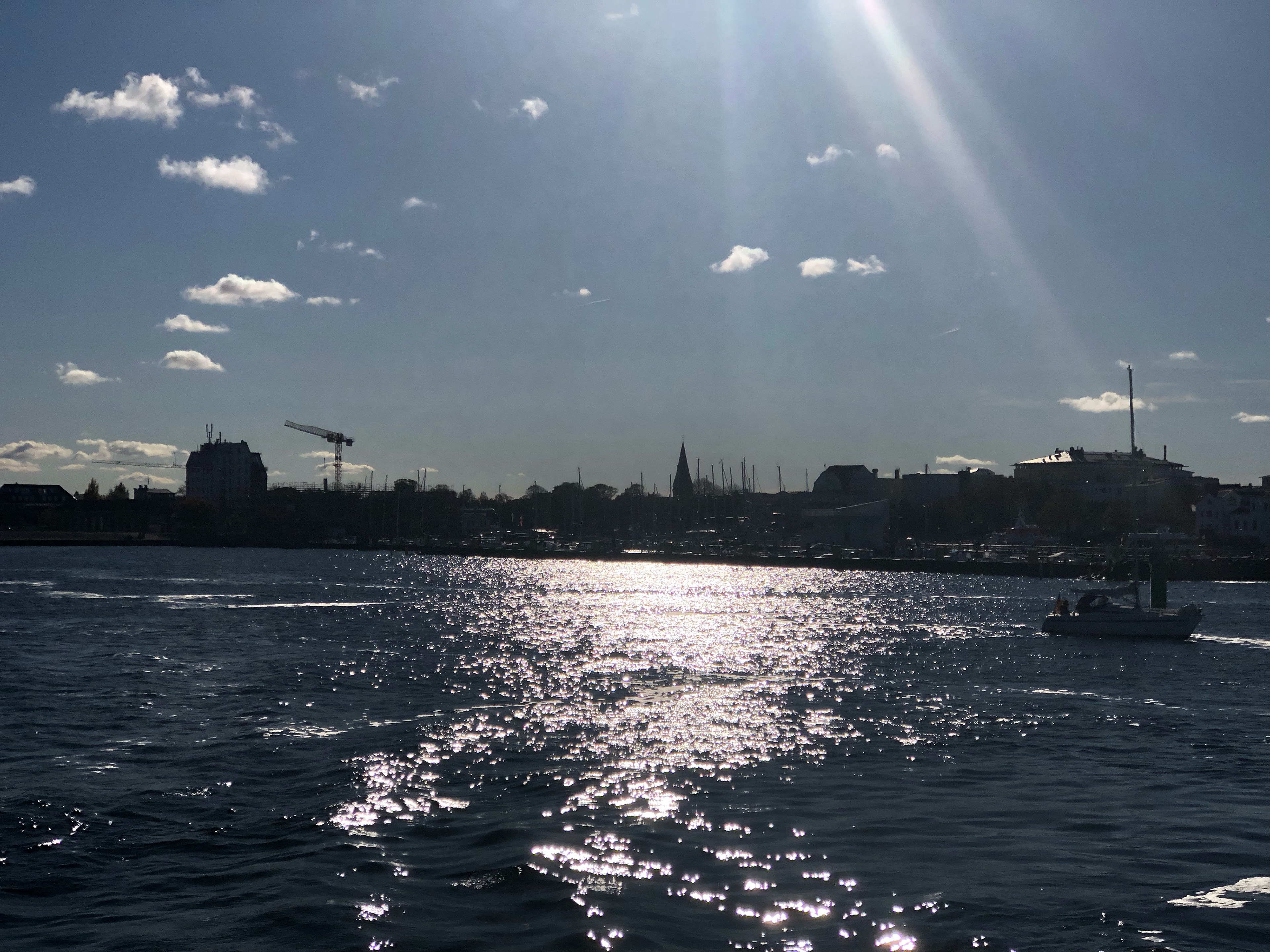 Warnemünde harbour in late afternoon sunlight