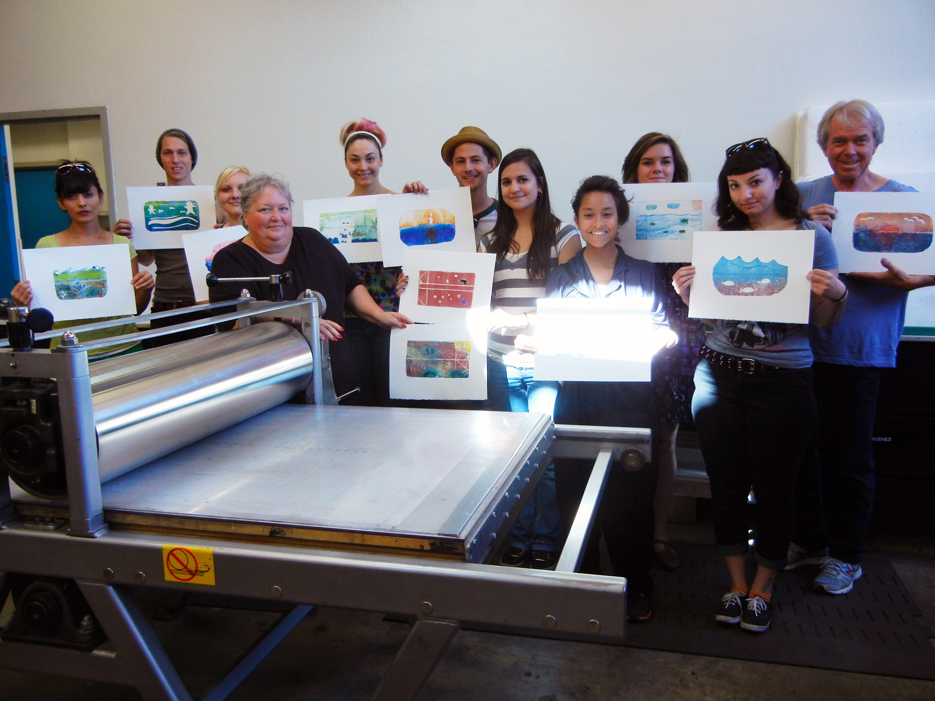 The UNM students printed Milk carton drypoint prints.