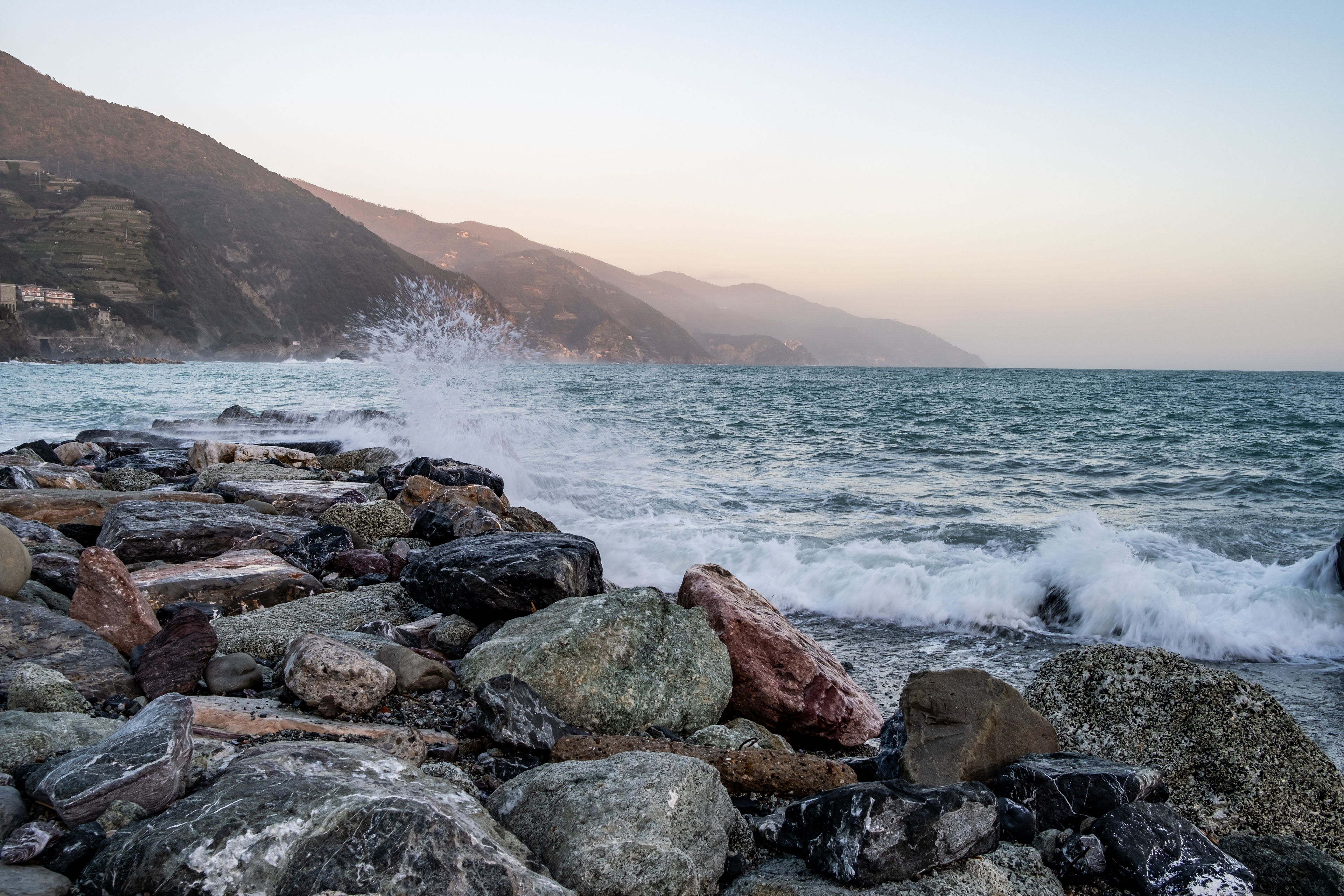 Colourful rocks on the beach, Monterosso al Mare, Italy