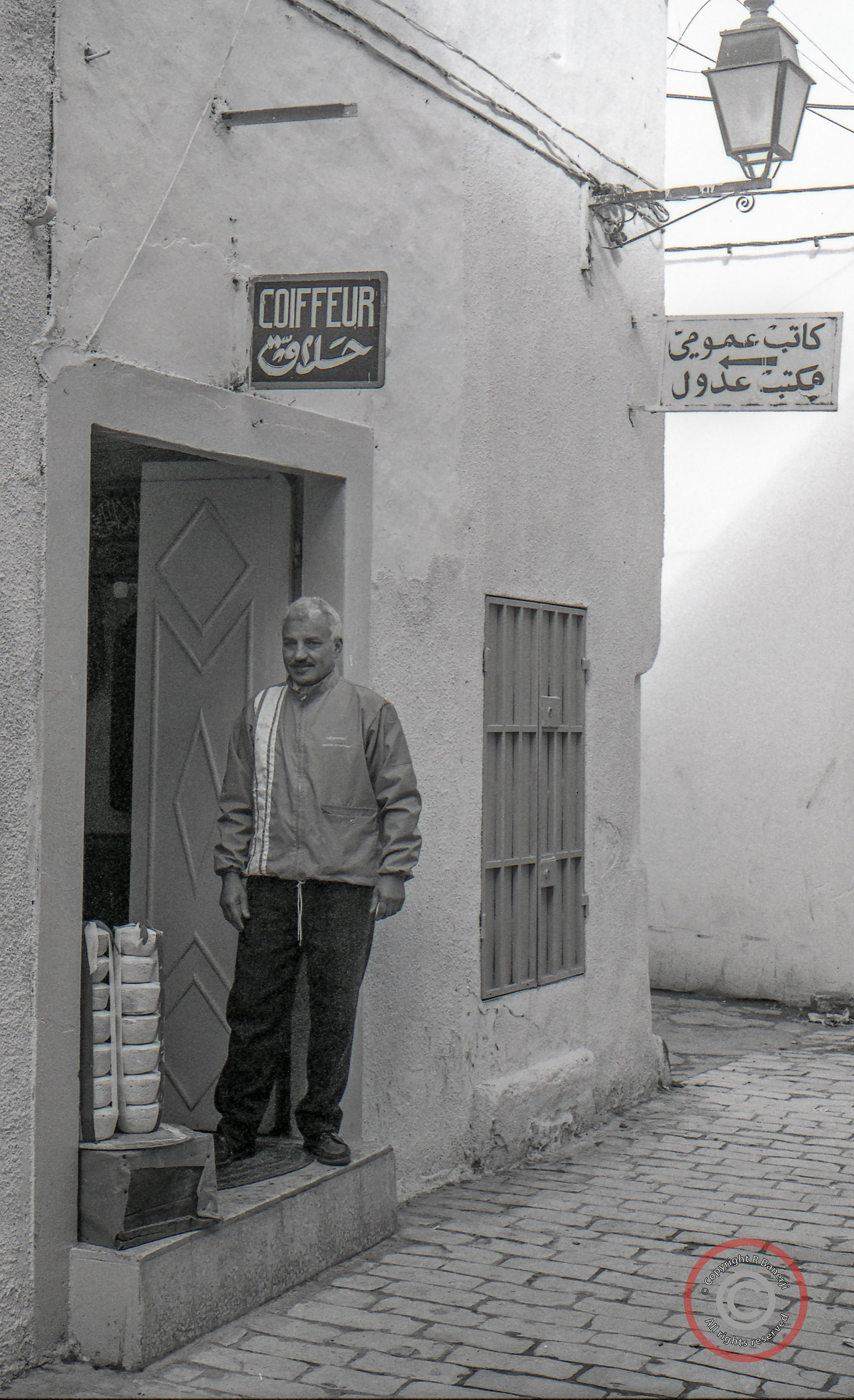 A barber waits for customers, Sousse, Tunisia