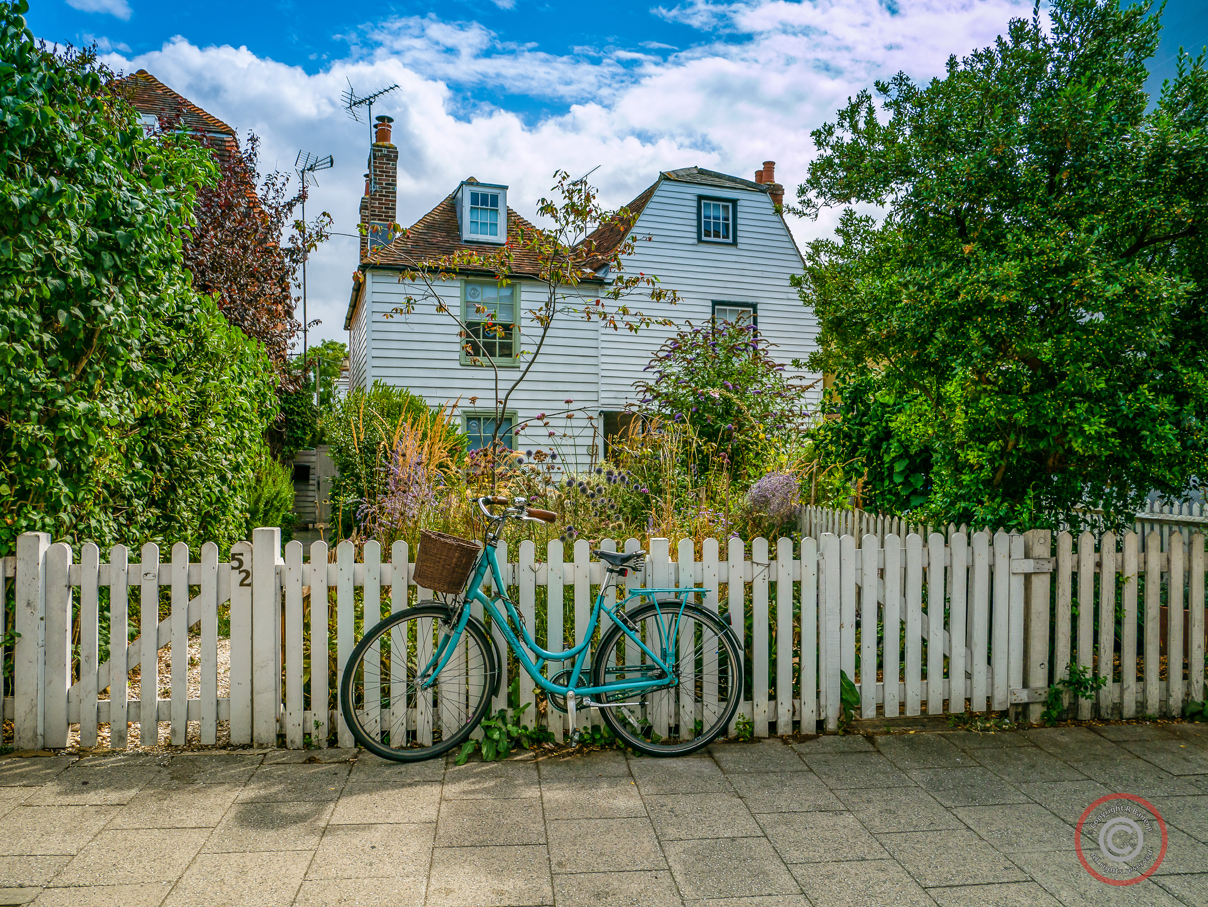 Old fashioned bicycle, old fashioned house, Whitstable, England