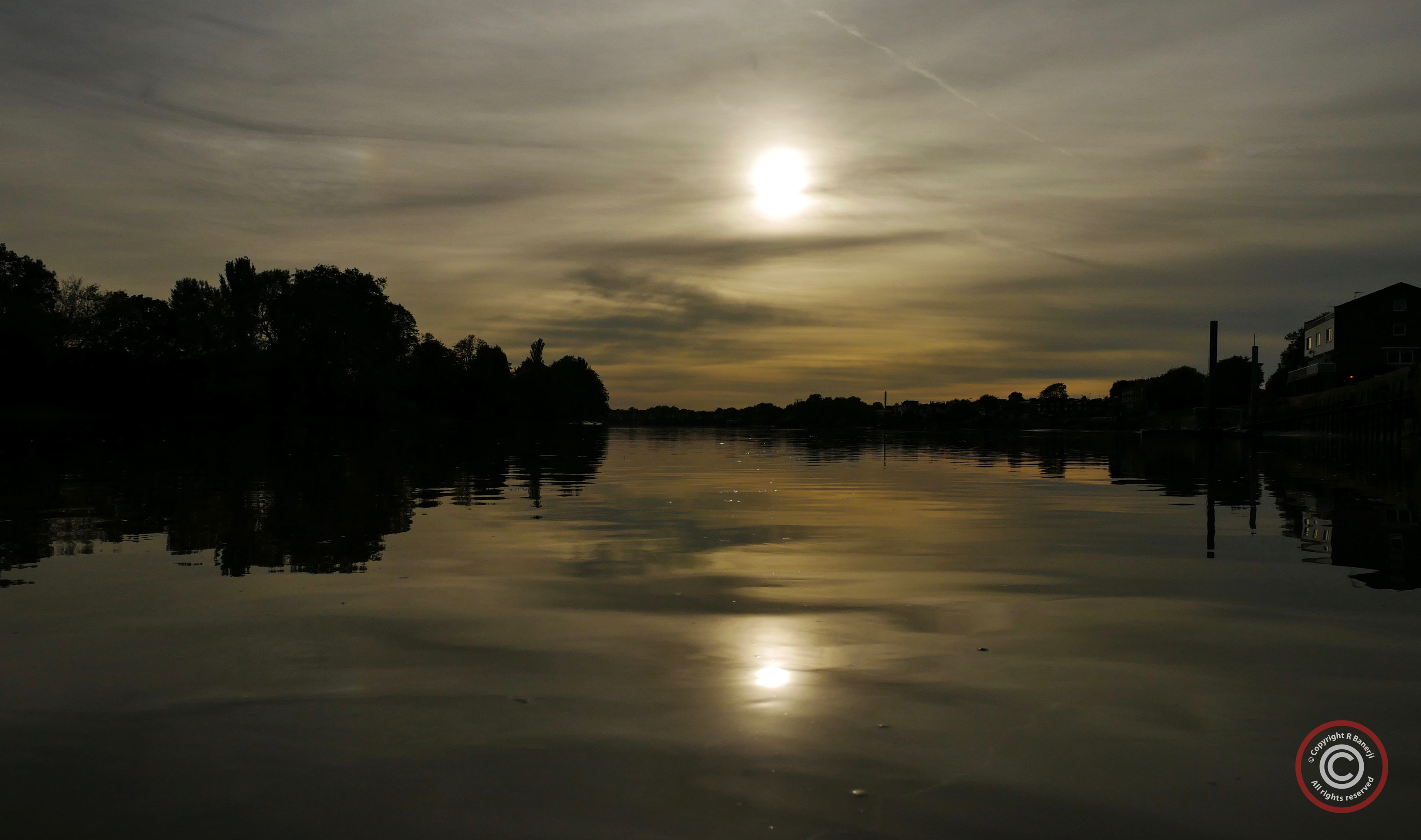 Sunset over calm waters, The Thames, Hammersmith