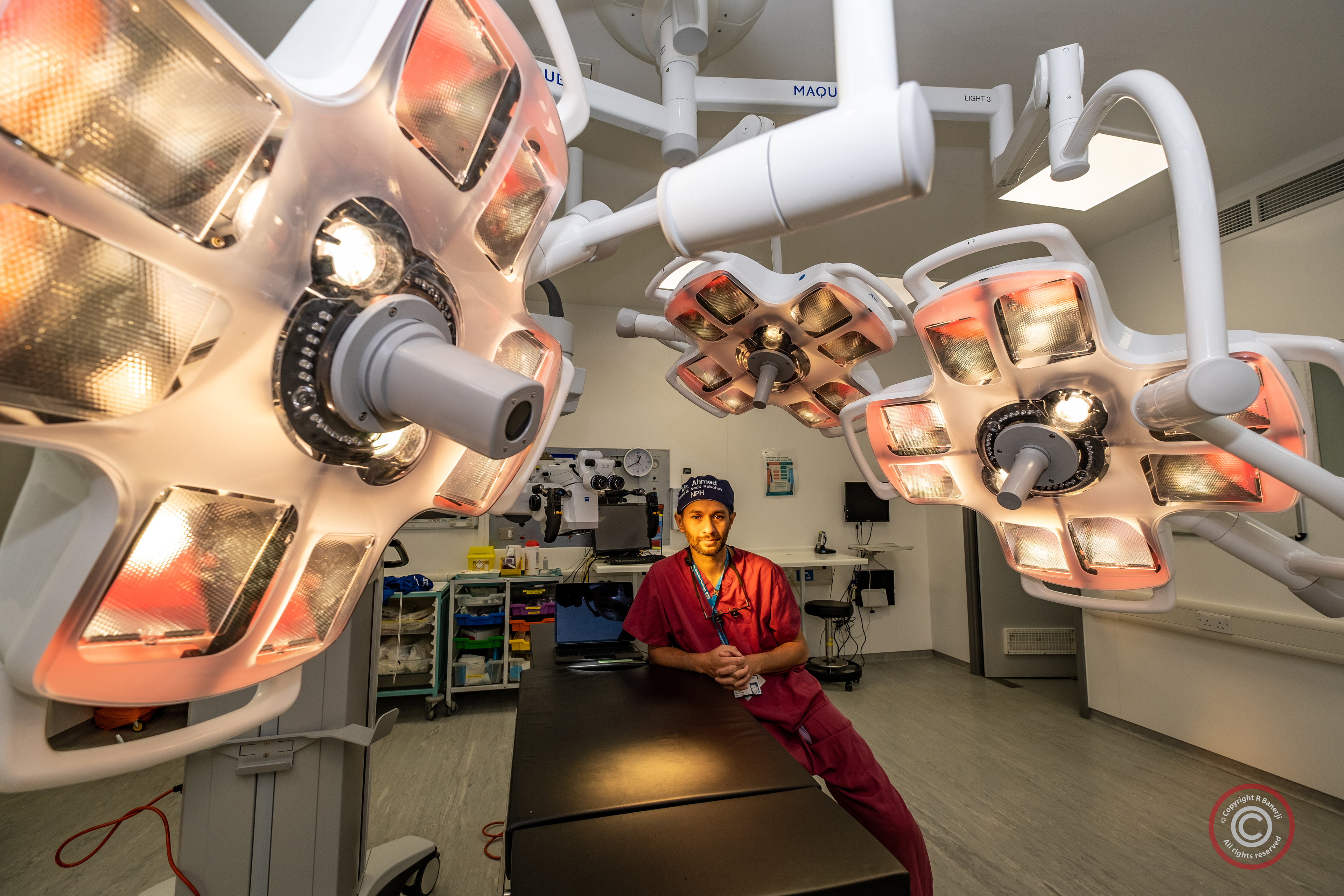 A robotics micro surgeon poses in an operating theatre at Northwick Park Hospital