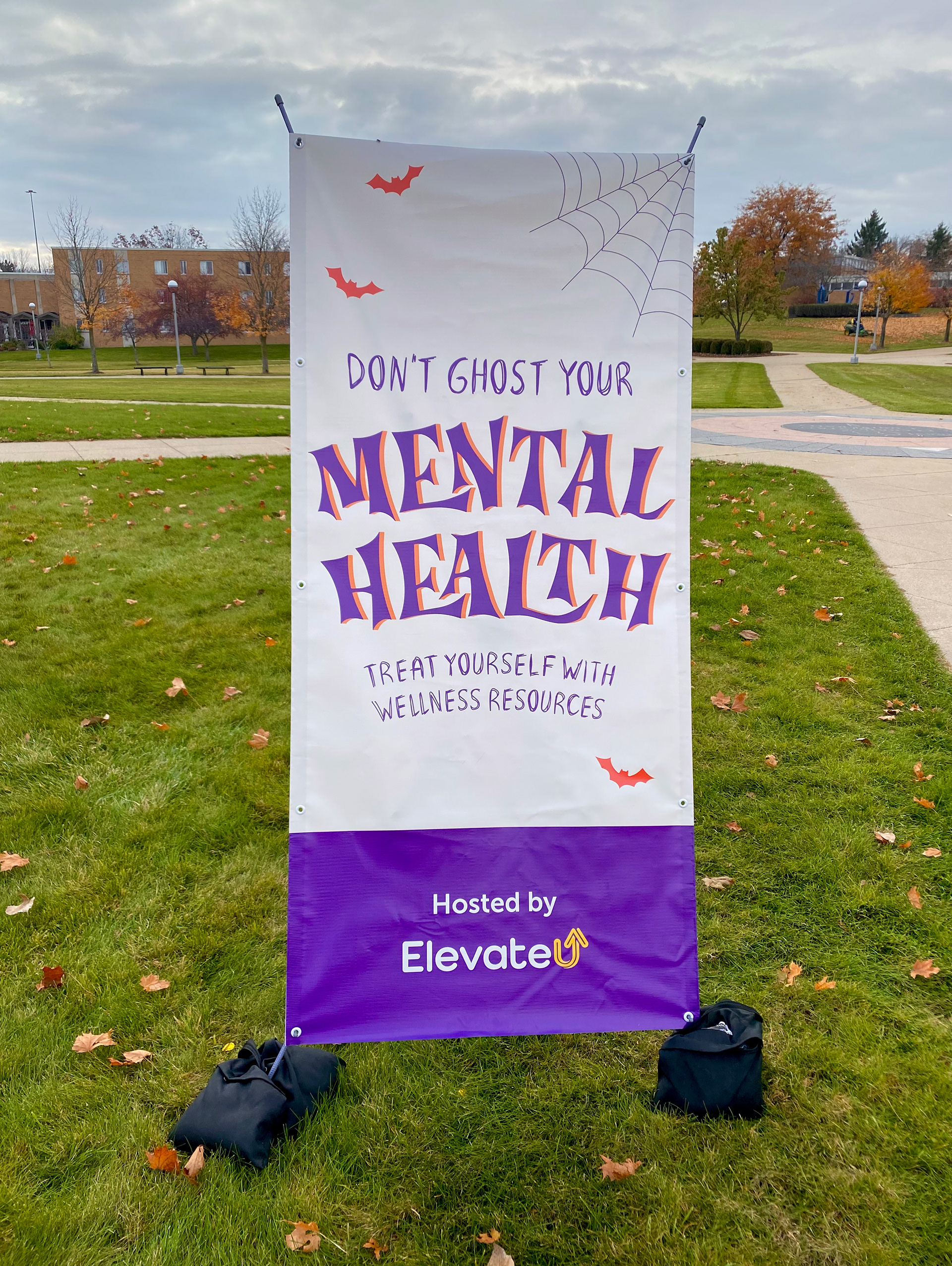 I designed the standing banner to face the opposite direction of the tent banner to catch the attention of people walking behind the booth.